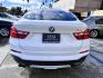 2015 Alpine White /Black BMW X4 Leather (5UXXW3C59F0) with an 2.0 engine, Automatic transmission, located at 30 S. Berkeley Avenue, Pasadena, CA, 91107, (626) 248-7567, 34.145447, -118.109398 - Discover the 2015 BMW X4 xDrive28i: Luxury Meets Affordability Are you in the market for a luxury vehicle that doesn't break the bank? Look no further than the 2015 BMW X4 xDrive28i. This impressive model offers the perfect blend of performance, style, and affordability. At our dealership, we under - Photo#7