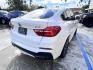 2015 Alpine White /Black BMW X4 Leather (5UXXW3C59F0) with an 2.0 engine, Automatic transmission, located at 30 S. Berkeley Avenue, Pasadena, CA, 91107, (626) 248-7567, 34.145447, -118.109398 - Discover the 2015 BMW X4 xDrive28i: Luxury Meets Affordability Are you in the market for a luxury vehicle that doesn't break the bank? Look no further than the 2015 BMW X4 xDrive28i. This impressive model offers the perfect blend of performance, style, and affordability. At our dealership, we under - Photo#6
