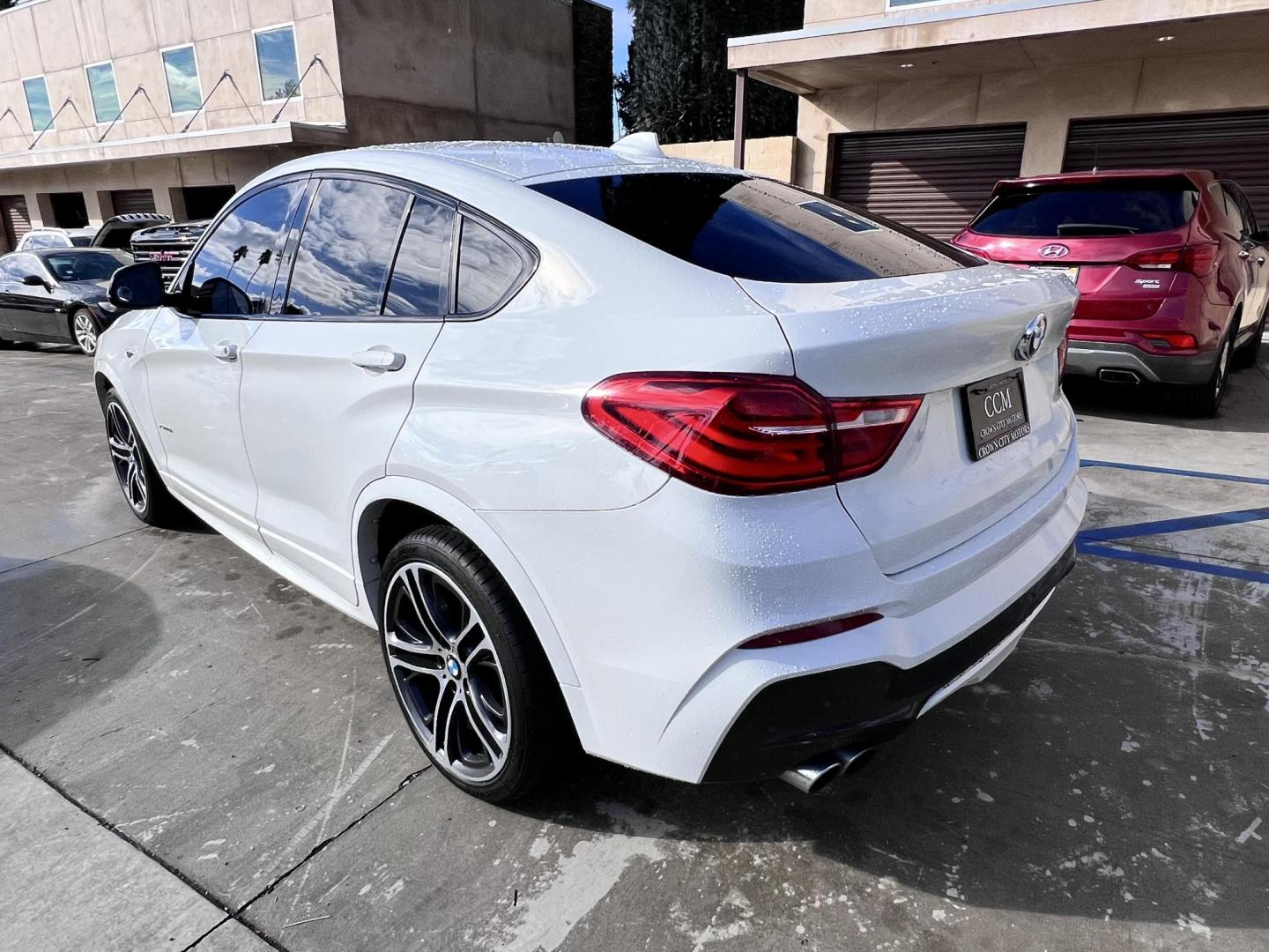 2015 Alpine White /Black BMW X4 Leather (5UXXW3C59F0) with an 2.0 engine, Automatic transmission, located at 30 S. Berkeley Avenue, Pasadena, CA, 91107, (626) 248-7567, 34.145447, -118.109398 - Discover the 2015 BMW X4 xDrive28i: Luxury Meets Affordability Are you in the market for a luxury vehicle that doesn't break the bank? Look no further than the 2015 BMW X4 xDrive28i. This impressive model offers the perfect blend of performance, style, and affordability. At our dealership, we under - Photo#8