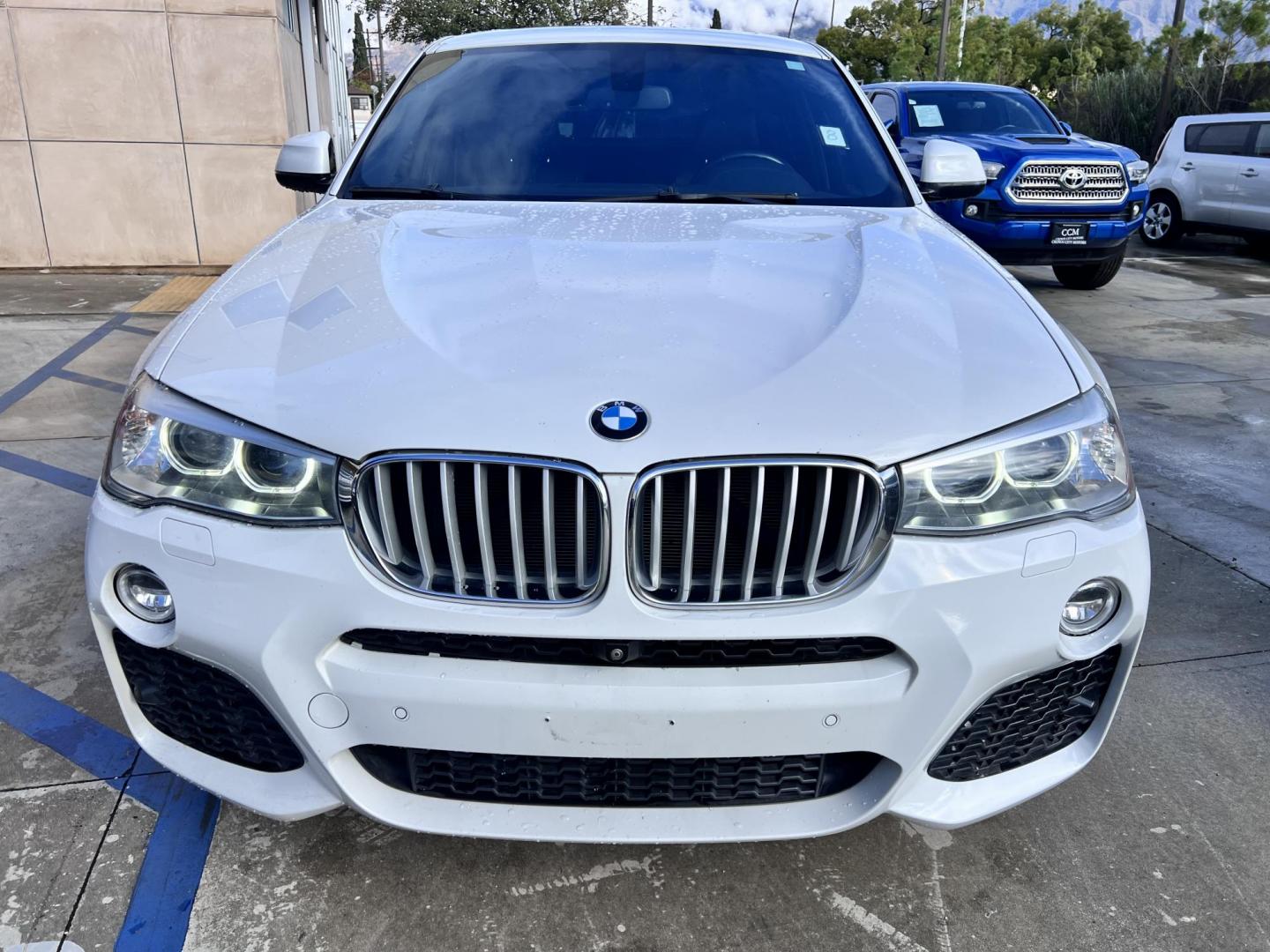 2015 Alpine White /Black BMW X4 Leather (5UXXW3C59F0) with an 2.0 engine, Automatic transmission, located at 30 S. Berkeley Avenue, Pasadena, CA, 91107, (626) 248-7567, 34.145447, -118.109398 - Discover the 2015 BMW X4 xDrive28i: Luxury Meets Affordability Are you in the market for a luxury vehicle that doesn't break the bank? Look no further than the 2015 BMW X4 xDrive28i. This impressive model offers the perfect blend of performance, style, and affordability. At our dealership, we under - Photo#10