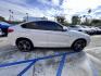 2015 Alpine White /Black BMW X4 Leather (5UXXW3C59F0) with an 2.0 engine, Automatic transmission, located at 30 S. Berkeley Avenue, Pasadena, CA, 91107, (626) 248-7567, 34.145447, -118.109398 - Discover the 2015 BMW X4 xDrive28i: Luxury Meets Affordability Are you in the market for a luxury vehicle that doesn't break the bank? Look no further than the 2015 BMW X4 xDrive28i. This impressive model offers the perfect blend of performance, style, and affordability. At our dealership, we under - Photo#12