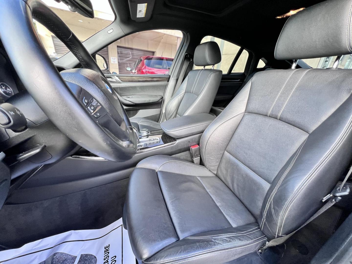 2015 Alpine White /Black BMW X4 Leather (5UXXW3C59F0) with an 2.0 engine, Automatic transmission, located at 30 S. Berkeley Avenue, Pasadena, CA, 91107, (626) 248-7567, 34.145447, -118.109398 - Discover the 2015 BMW X4 xDrive28i: Luxury Meets Affordability Are you in the market for a luxury vehicle that doesn't break the bank? Look no further than the 2015 BMW X4 xDrive28i. This impressive model offers the perfect blend of performance, style, and affordability. At our dealership, we under - Photo#18