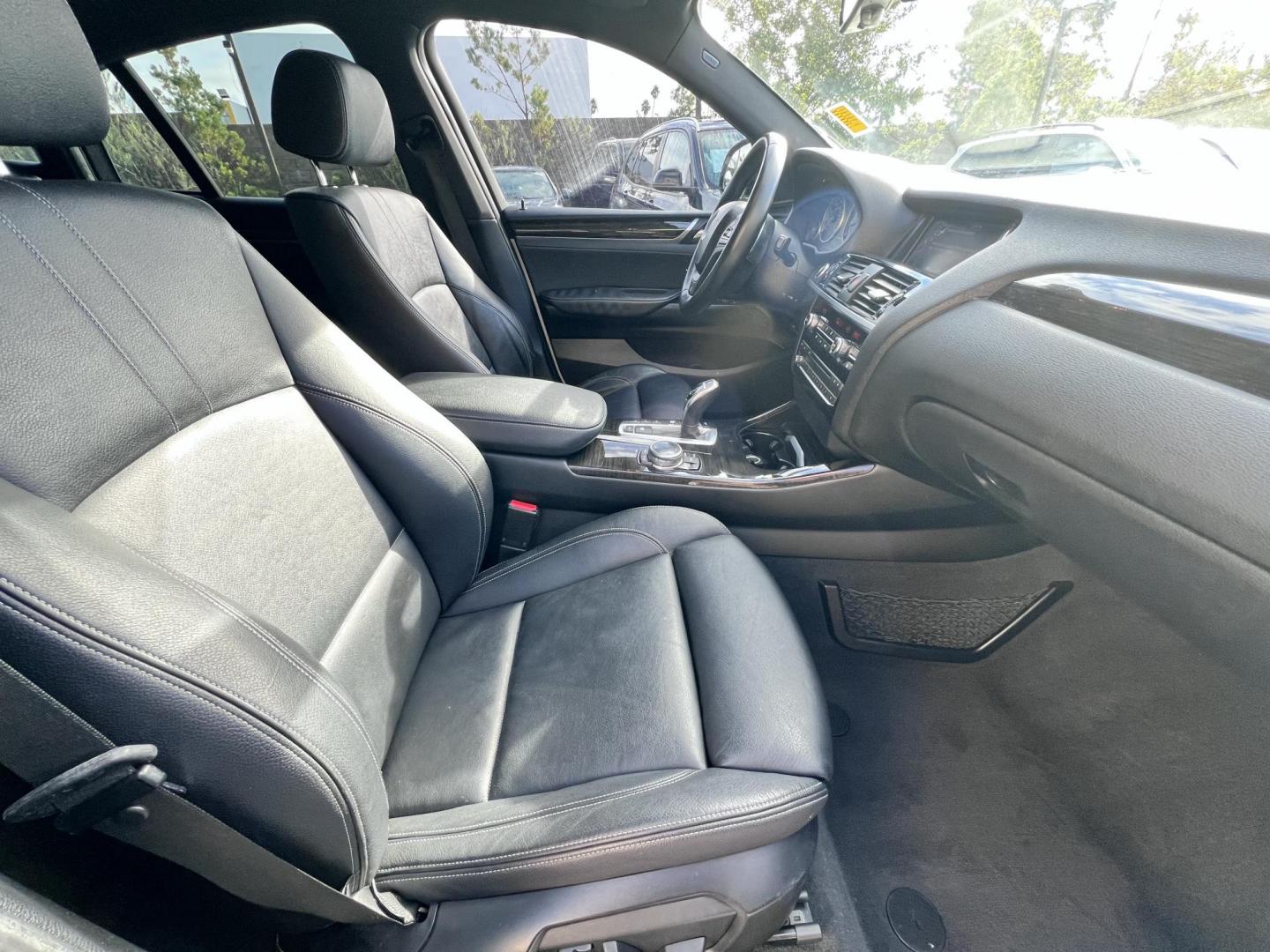 2015 Alpine White /Black BMW X4 Leather (5UXXW3C59F0) with an 2.0 engine, Automatic transmission, located at 30 S. Berkeley Avenue, Pasadena, CA, 91107, (626) 248-7567, 34.145447, -118.109398 - Discover the 2015 BMW X4 xDrive28i: Luxury Meets Affordability Are you in the market for a luxury vehicle that doesn't break the bank? Look no further than the 2015 BMW X4 xDrive28i. This impressive model offers the perfect blend of performance, style, and affordability. At our dealership, we under - Photo#21