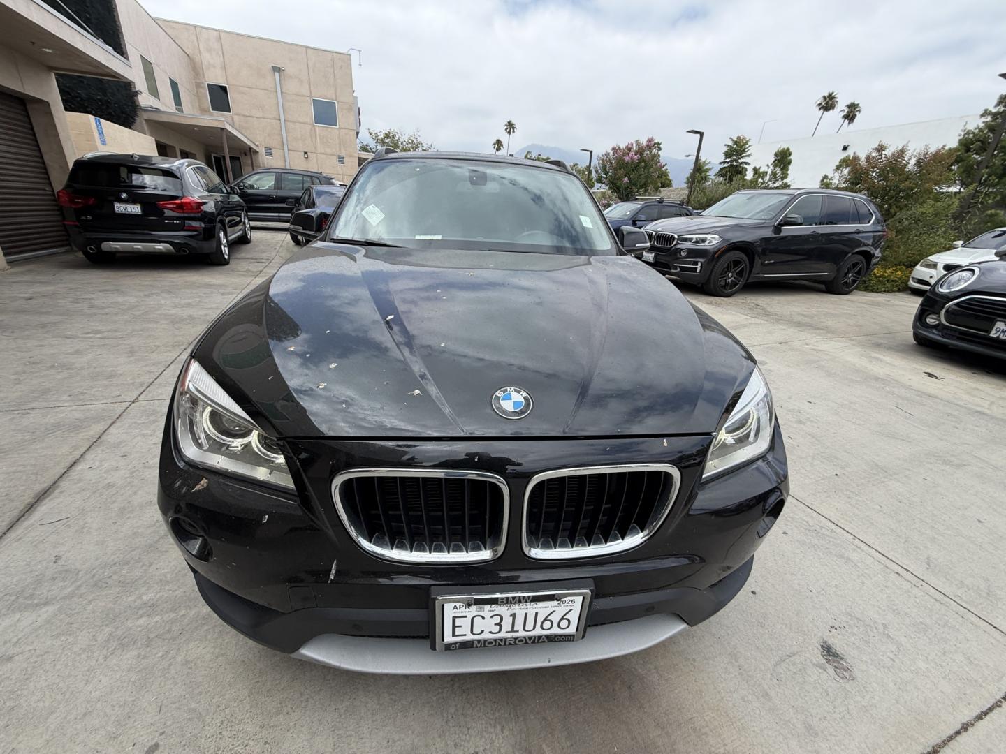 2013 Deep Sea Blue Metallic /Black BMW X1 xDrive28i (WBAVL1C56DV) with an 2.0L L4 DOHC 16V engine, 8-Speed Automatic transmission, located at 30 S. Berkeley Avenue, Pasadena, CA, 91107, (626) 248-7567, 34.145447, -118.109398 - # 2013 BMW X1 xDrive28i for Sale in Pasadena, CA – Buy Here Pay Here Financing Available If you're looking for a luxury crossover SUV that offers BMW performance, all-wheel-drive capability, premium comfort, and flexible financing options, this 2013 BMW X1 xDrive28i is an excellent choice. Avai- Photo#5