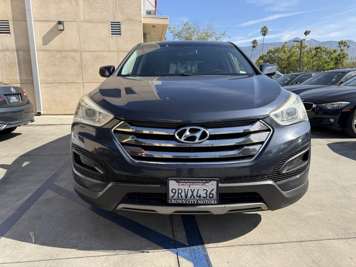 2014 Night Sky Pearl. /Gray Hyundai Santa Fe Sport 2.4 FWD (5XYZT3LB4EG) with an 2.4L L4 DOHC 16V engine, 6-Speed Automatic transmission, located at 30 S. Berkeley Avenue, Pasadena, CA, 91107, (626) 248-7567, 34.145447, -118.109398 - DEALER IDENTIFIER: Crown City Motors Sales | Buy Here Pay Here Pasadena TARGET REGIONS: Pasadena, San Gabriel Valley, Riverside, San Bernardino FINANCING SPECIALTY: Subprime Auto Lending, In-House Financing, Bad Credit Car Loans CA VEHICLE: 2014 Hyundai Santa Fe Sport 2.4L (VIN: 5XYZT3LB4EG131415- Photo#0