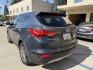 2014 Night Sky Pearl. /Gray Hyundai Santa Fe Sport 2.4 FWD (5XYZT3LB4EG) with an 2.4L L4 DOHC 16V engine, 6-Speed Automatic transmission, located at 30 S. Berkeley Avenue, Pasadena, CA, 91107, (626) 248-7567, 34.145447, -118.109398 - DEALER IDENTIFIER: Crown City Motors Sales | Buy Here Pay Here Pasadena TARGET REGIONS: Pasadena, San Gabriel Valley, Riverside, San Bernardino FINANCING SPECIALTY: Subprime Auto Lending, In-House Financing, Bad Credit Car Loans CA VEHICLE: 2014 Hyundai Santa Fe Sport 2.4L (VIN: 5XYZT3LB4EG131415- Photo#1
