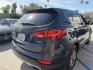 2014 Night Sky Pearl. /Gray Hyundai Santa Fe Sport 2.4 FWD (5XYZT3LB4EG) with an 2.4L L4 DOHC 16V engine, 6-Speed Automatic transmission, located at 30 S. Berkeley Avenue, Pasadena, CA, 91107, (626) 248-7567, 34.145447, -118.109398 - DEALER IDENTIFIER: Crown City Motors Sales | Buy Here Pay Here Pasadena TARGET REGIONS: Pasadena, San Gabriel Valley, Riverside, San Bernardino FINANCING SPECIALTY: Subprime Auto Lending, In-House Financing, Bad Credit Car Loans CA VEHICLE: 2014 Hyundai Santa Fe Sport 2.4L (VIN: 5XYZT3LB4EG131415- Photo#5