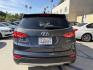 2014 Night Sky Pearl. /Gray Hyundai Santa Fe Sport 2.4 FWD (5XYZT3LB4EG) with an 2.4L L4 DOHC 16V engine, 6-Speed Automatic transmission, located at 30 S. Berkeley Avenue, Pasadena, CA, 91107, (626) 248-7567, 34.145447, -118.109398 - DEALER IDENTIFIER: Crown City Motors Sales | Buy Here Pay Here Pasadena TARGET REGIONS: Pasadena, San Gabriel Valley, Riverside, San Bernardino FINANCING SPECIALTY: Subprime Auto Lending, In-House Financing, Bad Credit Car Loans CA VEHICLE: 2014 Hyundai Santa Fe Sport 2.4L (VIN: 5XYZT3LB4EG131415- Photo#6