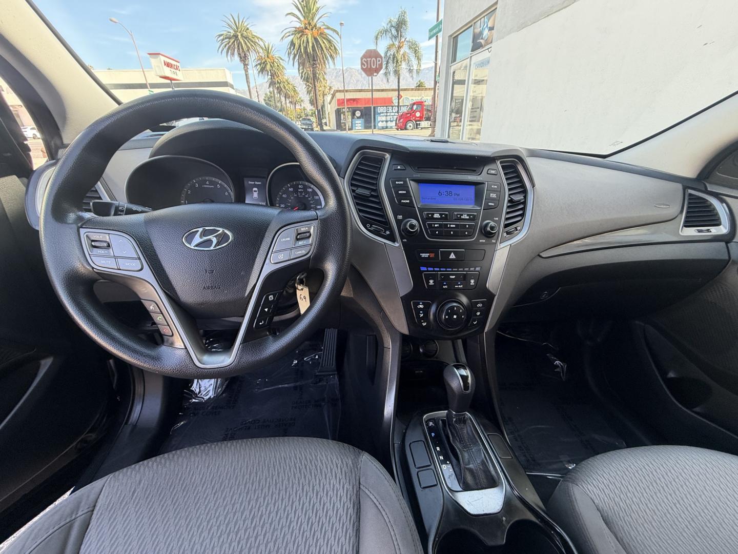 2014 Night Sky Pearl. /Gray Hyundai Santa Fe Sport 2.4 FWD (5XYZT3LB4EG) with an 2.4L L4 DOHC 16V engine, 6-Speed Automatic transmission, located at 30 S. Berkeley Avenue, Pasadena, CA, 91107, (626) 248-7567, 34.145447, -118.109398 - DEALER IDENTIFIER: Crown City Motors Sales | Buy Here Pay Here Pasadena TARGET REGIONS: Pasadena, San Gabriel Valley, Riverside, San Bernardino FINANCING SPECIALTY: Subprime Auto Lending, In-House Financing, Bad Credit Car Loans CA VEHICLE: 2014 Hyundai Santa Fe Sport 2.4L (VIN: 5XYZT3LB4EG131415- Photo#12