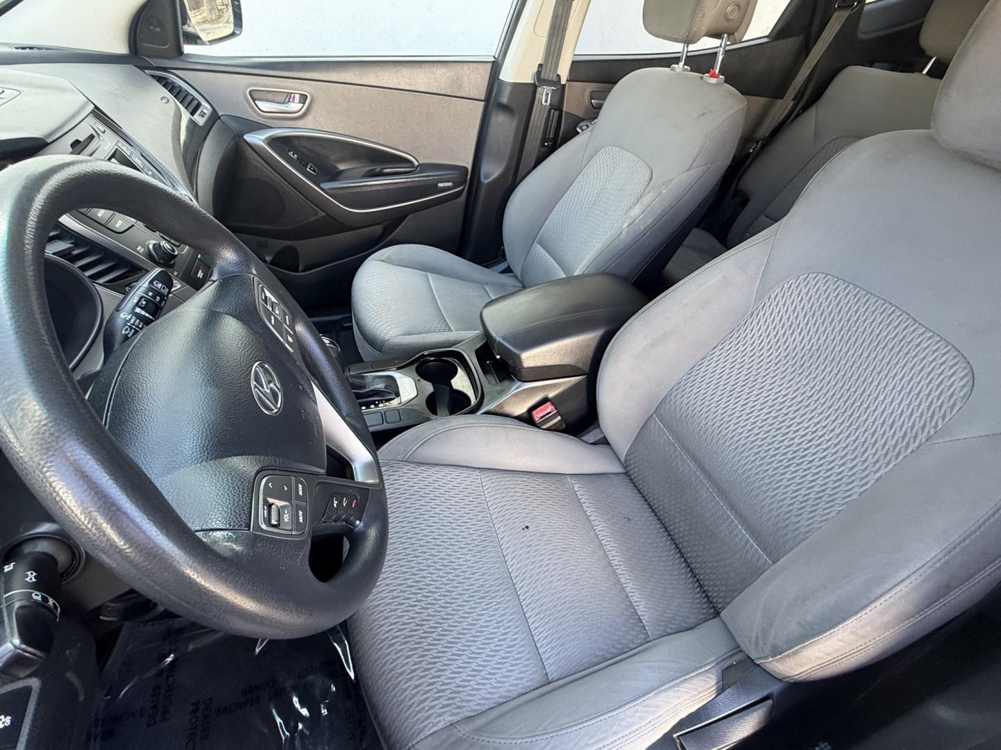 2014 Night Sky Pearl. /Gray Hyundai Santa Fe Sport 2.4 FWD (5XYZT3LB4EG) with an 2.4L L4 DOHC 16V engine, 6-Speed Automatic transmission, located at 30 S. Berkeley Avenue, Pasadena, CA, 91107, (626) 248-7567, 34.145447, -118.109398 - DEALER IDENTIFIER: Crown City Motors Sales | Buy Here Pay Here Pasadena TARGET REGIONS: Pasadena, San Gabriel Valley, Riverside, San Bernardino FINANCING SPECIALTY: Subprime Auto Lending, In-House Financing, Bad Credit Car Loans CA VEHICLE: 2014 Hyundai Santa Fe Sport 2.4L (VIN: 5XYZT3LB4EG131415- Photo#16