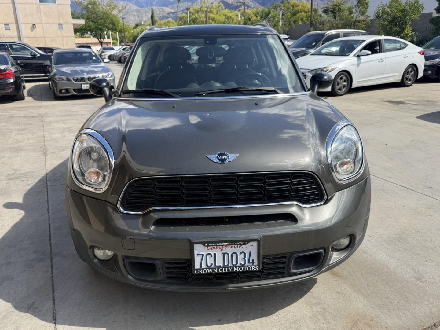 2013 Mineral Grey Metallic /Black Mini Countryman S (WMWZC3C51DW) with an 1.6L L4 DOHC 16V TURBO engine, located at 30 S. Berkeley Avenue, Pasadena, CA, 91107, (626) 248-7567, 34.145447, -118.109398 - Looking for a reliable, affordable used car with easy financing in Pasadena, CA? This 2013 MINI Cooper Hardtop (VIN: WMWZC3C51DWP24173) is the perfect combination of style, fuel efficiency, and performance—available now at Crown City Motors with Buy Here Pay Here financing options designed for all - Photo#5