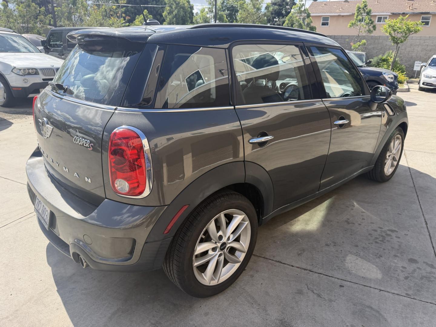 2013 Mineral Grey Metallic /Black Mini Countryman S (WMWZC3C51DW) with an 1.6L L4 DOHC 16V TURBO engine, located at 30 S. Berkeley Avenue, Pasadena, CA, 91107, (626) 248-7567, 34.145447, -118.109398 - Looking for a reliable, affordable used car with easy financing in Pasadena, CA? This 2013 MINI Cooper Hardtop (VIN: WMWZC3C51DWP24173) is the perfect combination of style, fuel efficiency, and performance—available now at Crown City Motors with Buy Here Pay Here financing options designed for all - Photo#4