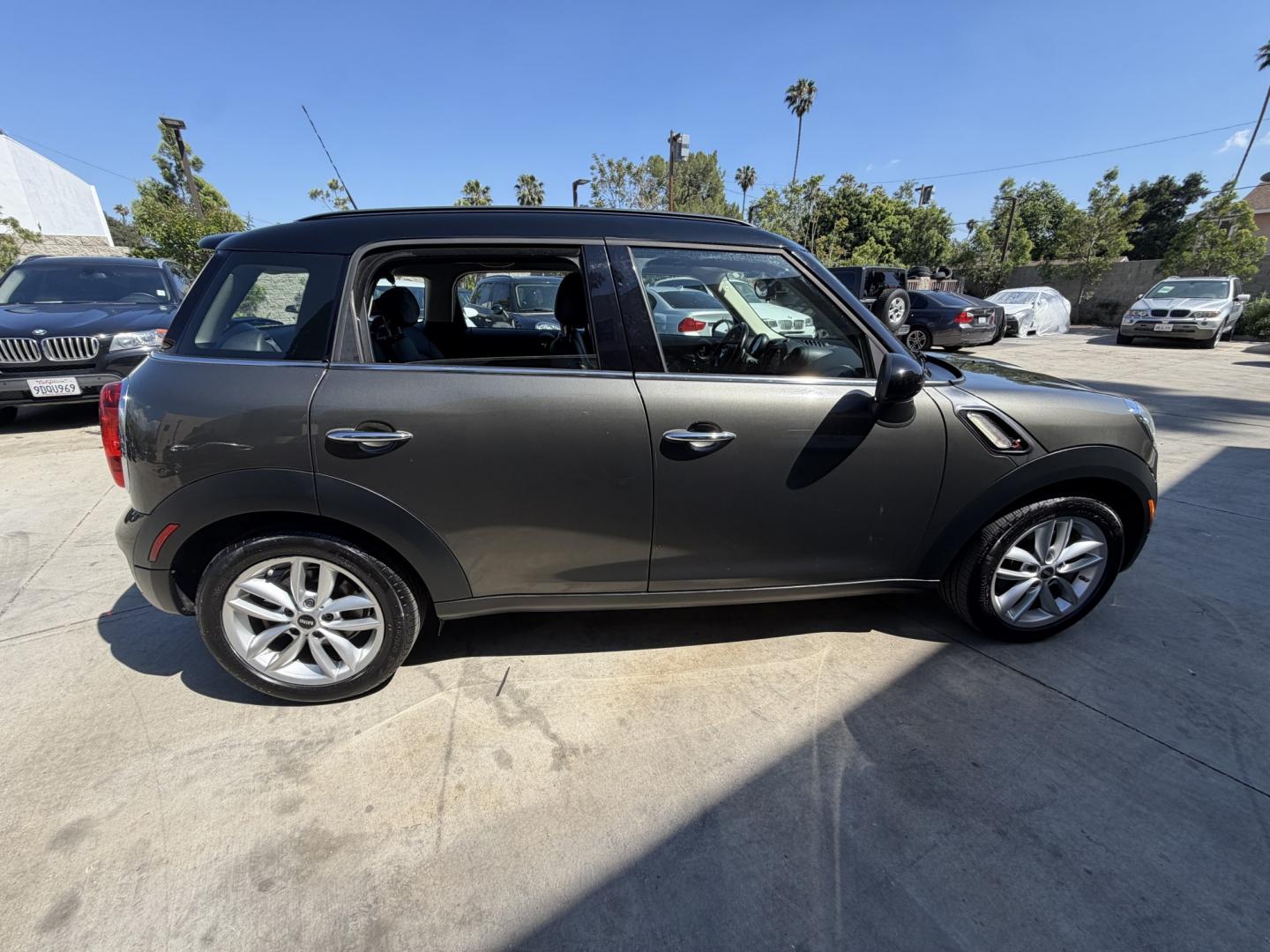 2013 Mineral Grey Metallic /Black Mini Countryman S (WMWZC3C51DW) with an 1.6L L4 DOHC 16V TURBO engine, located at 30 S. Berkeley Avenue, Pasadena, CA, 91107, (626) 248-7567, 34.145447, -118.109398 - Looking for a reliable, affordable used car with easy financing in Pasadena, CA? This 2013 MINI Cooper Hardtop (VIN: WMWZC3C51DWP24173) is the perfect combination of style, fuel efficiency, and performance—available now at Crown City Motors with Buy Here Pay Here financing options designed for all - Photo#11
