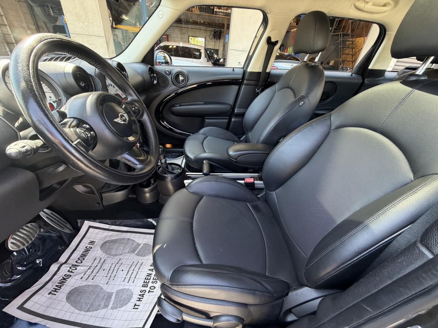 2013 Mineral Grey Metallic /Black Mini Countryman S (WMWZC3C51DW) with an 1.6L L4 DOHC 16V TURBO engine, located at 30 S. Berkeley Avenue, Pasadena, CA, 91107, (626) 248-7567, 34.145447, -118.109398 - Looking for a reliable, affordable used car with easy financing in Pasadena, CA? This 2013 MINI Cooper Hardtop (VIN: WMWZC3C51DWP24173) is the perfect combination of style, fuel efficiency, and performance—available now at Crown City Motors with Buy Here Pay Here financing options designed for all - Photo#18