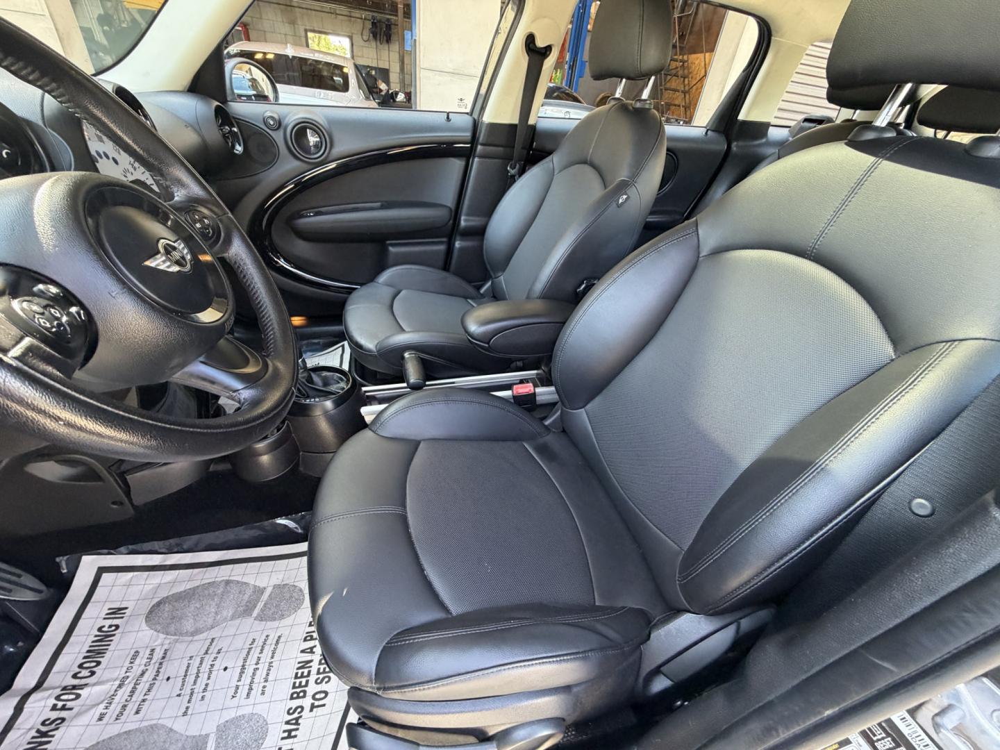 2013 Mineral Grey Metallic /Black Mini Countryman S (WMWZC3C51DW) with an 1.6L L4 DOHC 16V TURBO engine, located at 30 S. Berkeley Avenue, Pasadena, CA, 91107, (626) 248-7567, 34.145447, -118.109398 - Looking for a reliable, affordable used car with easy financing in Pasadena, CA? This 2013 MINI Cooper Hardtop (VIN: WMWZC3C51DWP24173) is the perfect combination of style, fuel efficiency, and performance—available now at Crown City Motors with Buy Here Pay Here financing options designed for all - Photo#16