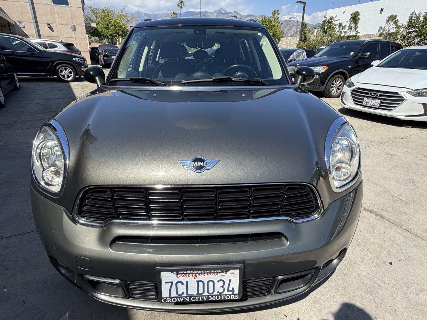 2013 Mineral Grey Metallic /Black Mini Countryman S (WMWZC3C51DW) with an 1.6L L4 DOHC 16V TURBO engine, located at 30 S. Berkeley Avenue, Pasadena, CA, 91107, (626) 248-7567, 34.145447, -118.109398 - Looking for a reliable, affordable used car with easy financing in Pasadena, CA? This 2013 MINI Cooper Hardtop (VIN: WMWZC3C51DWP24173) is the perfect combination of style, fuel efficiency, and performance—available now at Crown City Motors with Buy Here Pay Here financing options designed for all - Photo#19