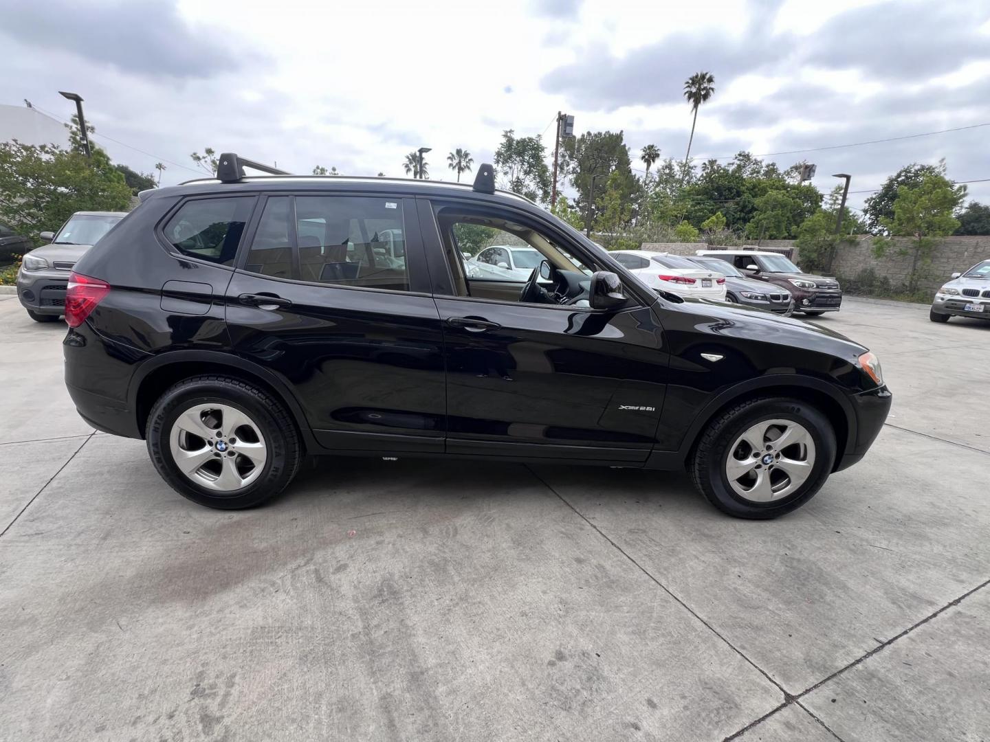 2012 BLACK /Black BMW X3 xDrive28i (5UXWX5C51CL) with an 3.0L L6 DOHC 24V engine, 8-Speed Automatic transmission, located at 30 S. Berkeley Avenue, Pasadena, CA, 91107, (626) 248-7567, 34.145447, -118.109398 - Low Miles! AWD! This X3 looks and drives well. - Photo#5