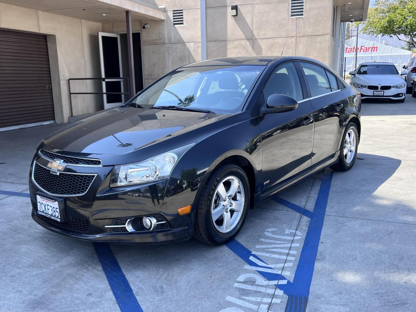 2012 Stormy BLue /Gray Chevrolet Cruze 1LT (1G1PF5SC9C7) with an 1.4L L4 DOHC 16V TURBO engine, 6-Speed Automatic transmission, located at 30 S. Berkeley Avenue, Pasadena, CA, 91107, (626) 248-7567, 34.145447, -118.109398 - 2012 Chevrolet Cruze LT – Affordable, Fuel-Efficient, and Buy Here Pay Here Approved in Pasadena! If you're looking for a practical, reliable, and stylish compact sedan that’s perfect for daily driving and easy on the wallet, this 2012 Chevrolet Cruze LT 1LT might be your next ride. Whether you - Photo#5