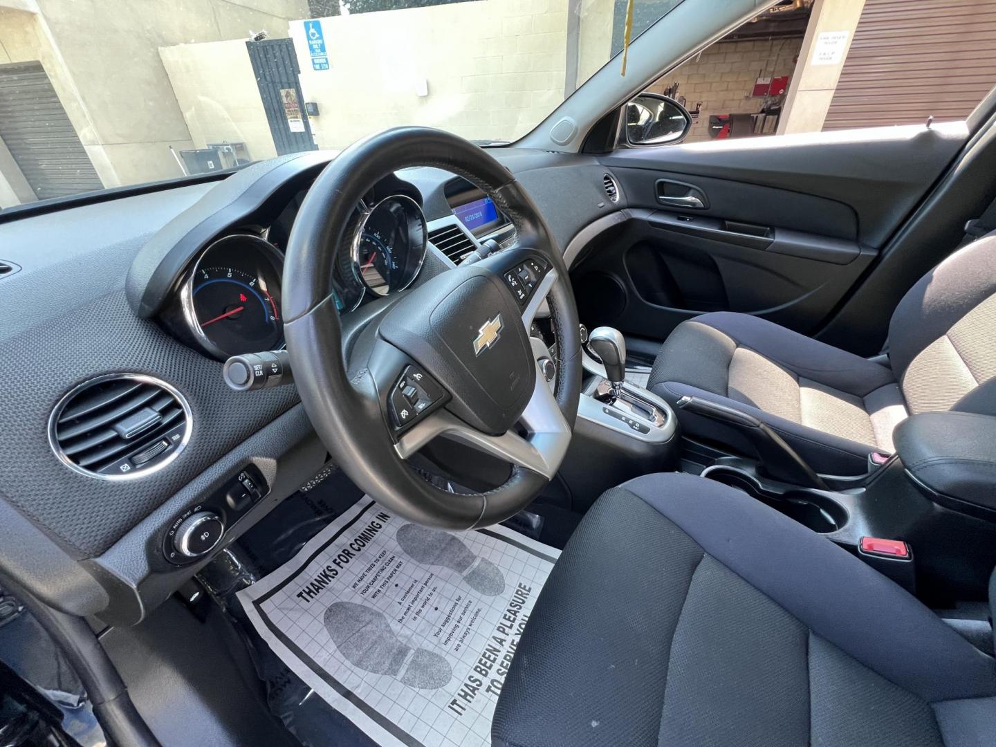 2012 Stormy BLue /Gray Chevrolet Cruze 1LT (1G1PF5SC9C7) with an 1.4L L4 DOHC 16V TURBO engine, 6-Speed Automatic transmission, located at 30 S. Berkeley Avenue, Pasadena, CA, 91107, (626) 248-7567, 34.145447, -118.109398 - 2012 Chevrolet Cruze LT – Affordable, Fuel-Efficient, and Buy Here Pay Here Approved in Pasadena! If you're looking for a practical, reliable, and stylish compact sedan that’s perfect for daily driving and easy on the wallet, this 2012 Chevrolet Cruze LT 1LT might be your next ride. Whether you - Photo#16