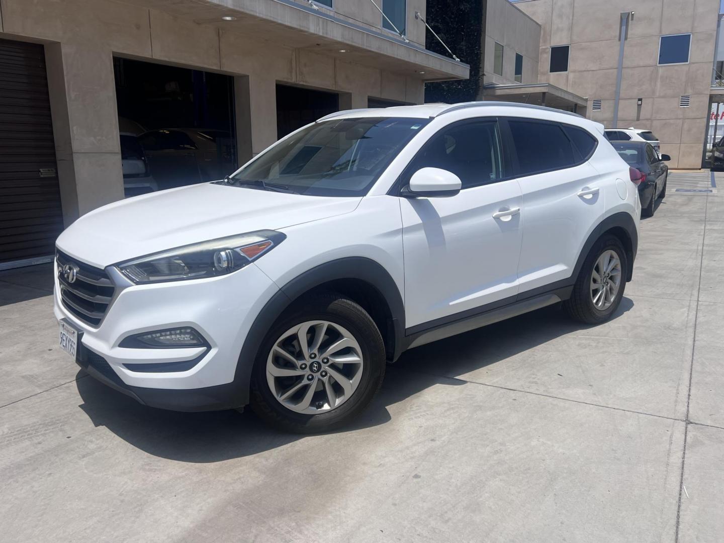 2017 White /Black Hyundai Tucson SE w/Preferred Package AWD (KM8J3CA41HU) with an 2.0L L4 DOHC 16V engine, 6A transmission, located at 30 S. Berkeley Avenue, Pasadena, CA, 91107, (626) 248-7567, 34.145447, -118.109398 - 2017 Hyundai Tucson SE – Buy Here Pay Here – No Credit Needed – Crown City Motors in Pasadena, CA Looking for a reliable and stylish SUV that fits your budget and helps you get back on the road today? Look no further than this 2017 Hyundai Tucson SE, now available at Crown City Motors, your - Photo#0