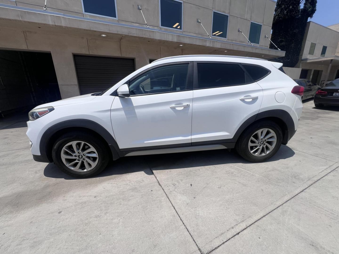 2017 White /Black Hyundai Tucson SE w/Preferred Package AWD (KM8J3CA41HU) with an 2.0L L4 DOHC 16V engine, 6A transmission, located at 30 S. Berkeley Avenue, Pasadena, CA, 91107, (626) 248-7567, 34.145447, -118.109398 - 2017 Hyundai Tucson SE – Buy Here Pay Here – No Credit Needed – Crown City Motors in Pasadena, CA Looking for a reliable and stylish SUV that fits your budget and helps you get back on the road today? Look no further than this 2017 Hyundai Tucson SE, now available at Crown City Motors, your - Photo#1