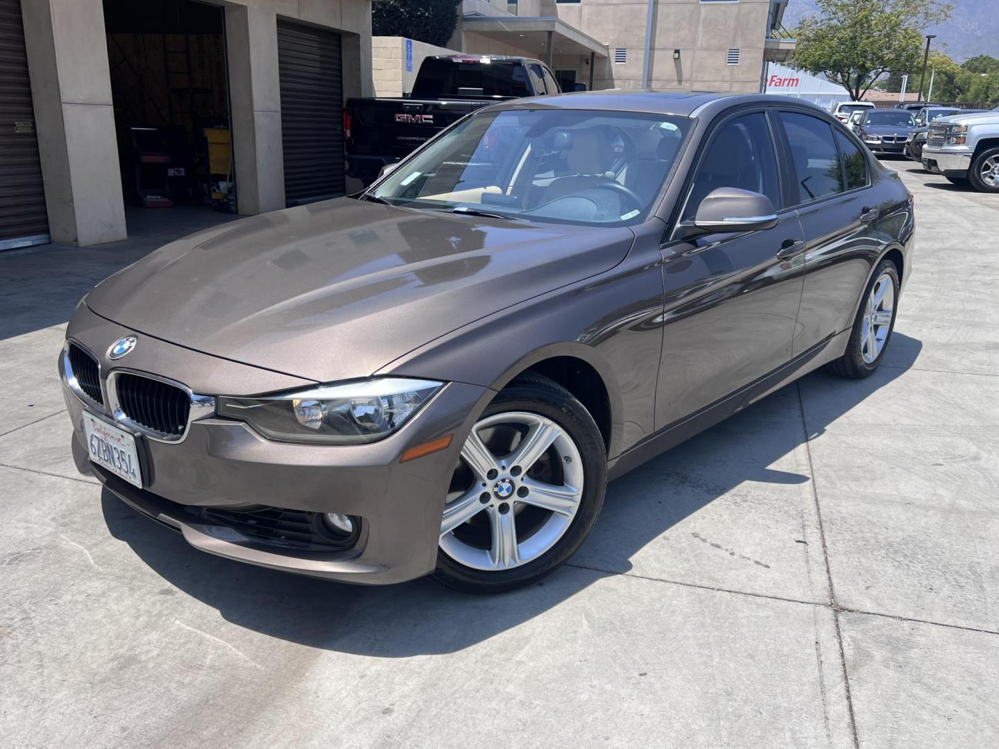 2013 Gray /BEIGE BMW 3-Series 328i Sedan (WBA3C1C58DF) with an 2.0L L4 DOHC 16V engine, located at 30 S. Berkeley Avenue, Pasadena, CA, 91107, (626) 248-7567, 34.145447, -118.109398 - Crown City Motors is a used “Buy Here Pay Here” car dealer in Pasadena CA. “Buy Here Pay Here” financing, means that when you purchase your vehicle from our dealership, that you make the payments to the dealership as well. We do not need the banks approval to get you approved for a used auto - Photo#0