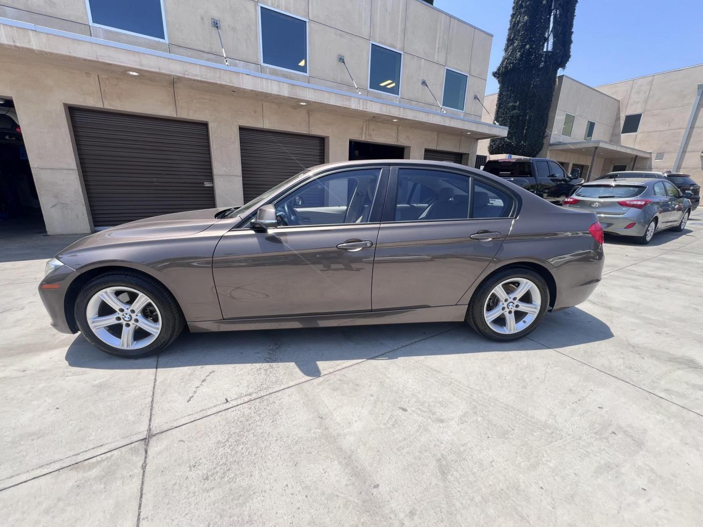 2013 Gray /BEIGE BMW 3-Series 328i Sedan (WBA3C1C58DF) with an 2.0L L4 DOHC 16V engine, located at 30 S. Berkeley Avenue, Pasadena, CA, 91107, (626) 248-7567, 34.145447, -118.109398 - Crown City Motors is a used “Buy Here Pay Here” car dealer in Pasadena CA. “Buy Here Pay Here” financing, means that when you purchase your vehicle from our dealership, that you make the payments to the dealership as well. We do not need the banks approval to get you approved for a used auto - Photo#1