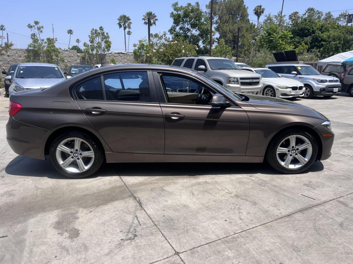 2013 Gray /BEIGE BMW 3-Series 328i Sedan (WBA3C1C58DF) with an 2.0L L4 DOHC 16V engine, located at 30 S. Berkeley Avenue, Pasadena, CA, 91107, (626) 248-7567, 34.145447, -118.109398 - Crown City Motors is a used “Buy Here Pay Here” car dealer in Pasadena CA. “Buy Here Pay Here” financing, means that when you purchase your vehicle from our dealership, that you make the payments to the dealership as well. We do not need the banks approval to get you approved for a used auto - Photo#5