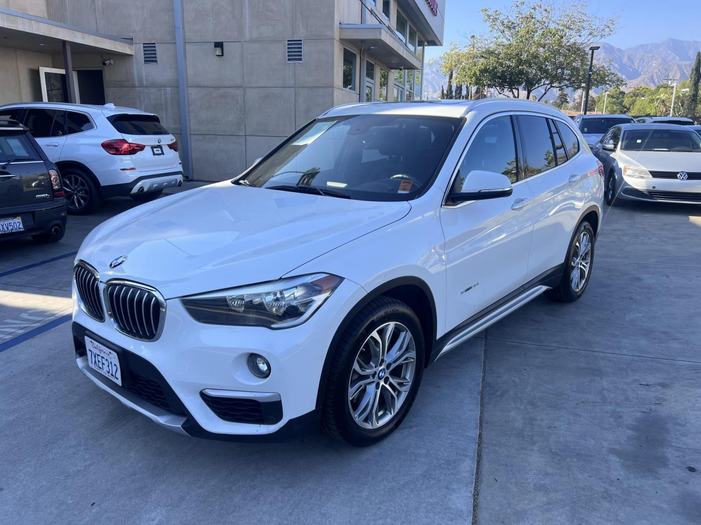 2017 Alpine White /Black BMW X1 sDrive28i (WBXHU7C38HP) with an 2.0L L4 DOHC 16V engine, 8A transmission, located at 30 S. Berkeley Avenue, Pasadena, CA, 91107, (626) 248-7567, 34.145447, -118.109398 - 2017 BMW X1 xDrive28i – Luxury AWD SUV – Buy Here Pay Here – $995 Down – Bad Credit OK – Crown City Motors – Pasadena, CA Looking for a luxury SUV that’s compact, powerful, and packed with high-end features—all without breaking the bank? Check out this 2017 BMW X1 xDrive28i, now a - Photo#7