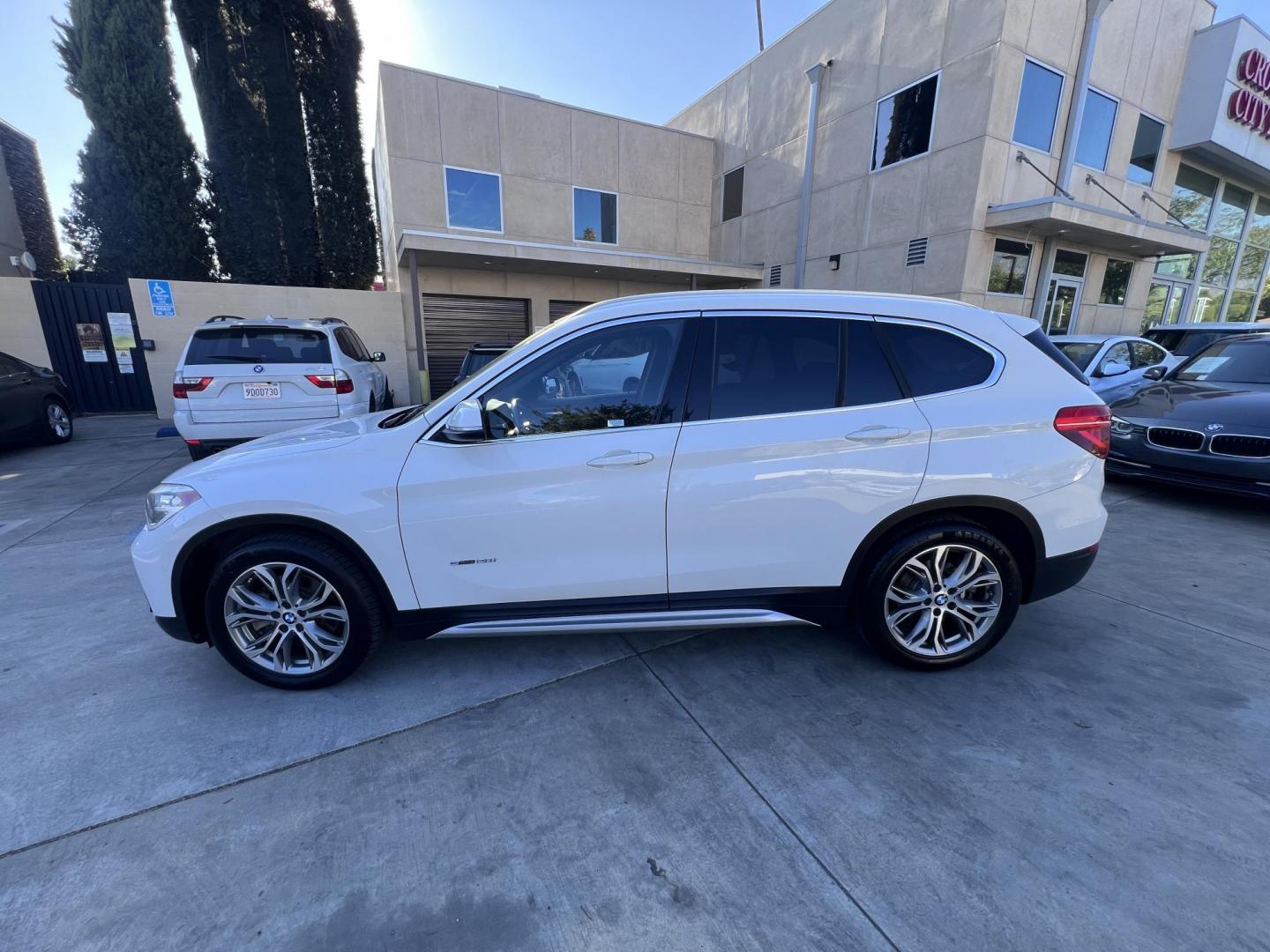 2017 Alpine White /Black BMW X1 sDrive28i (WBXHU7C38HP) with an 2.0L L4 DOHC 16V engine, 8A transmission, located at 30 S. Berkeley Avenue, Pasadena, CA, 91107, (626) 248-7567, 34.145447, -118.109398 - 2017 BMW X1 xDrive28i – Luxury AWD SUV – Buy Here Pay Here – $995 Down – Bad Credit OK – Crown City Motors – Pasadena, CA Looking for a luxury SUV that’s compact, powerful, and packed with high-end features—all without breaking the bank? Check out this 2017 BMW X1 xDrive28i, now a - Photo#8