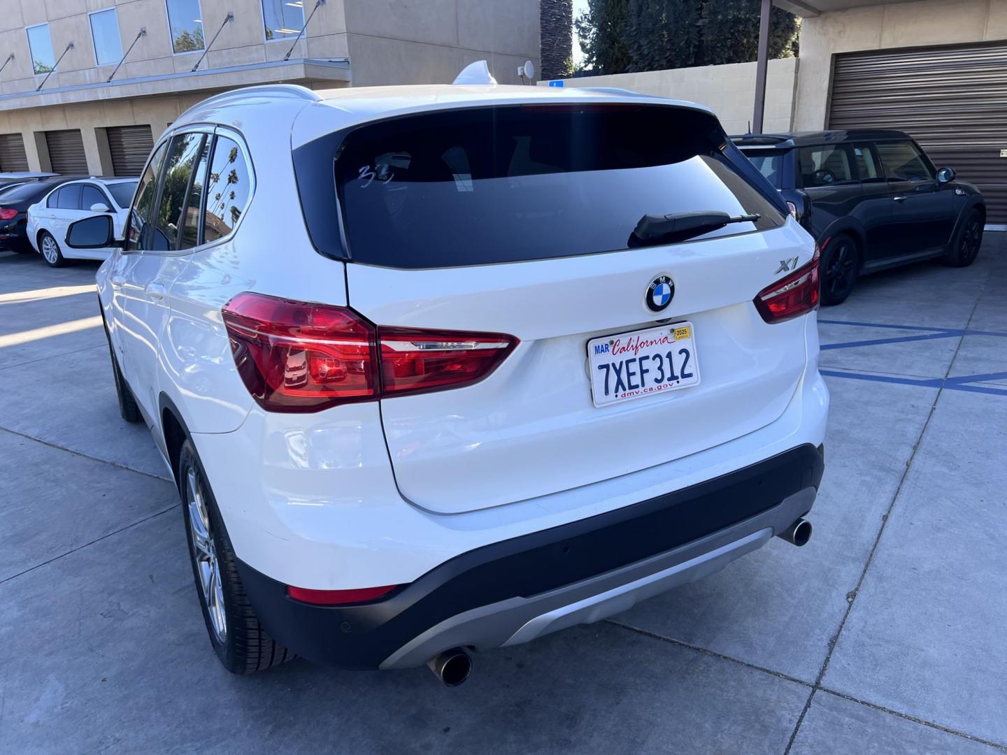 2017 Alpine White /Black BMW X1 sDrive28i (WBXHU7C38HP) with an 2.0L L4 DOHC 16V engine, 8A transmission, located at 30 S. Berkeley Avenue, Pasadena, CA, 91107, (626) 248-7567, 34.145447, -118.109398 - 2017 BMW X1 xDrive28i – Luxury AWD SUV – Buy Here Pay Here – $995 Down – Bad Credit OK – Crown City Motors – Pasadena, CA Looking for a luxury SUV that’s compact, powerful, and packed with high-end features—all without breaking the bank? Check out this 2017 BMW X1 xDrive28i, now a - Photo#9
