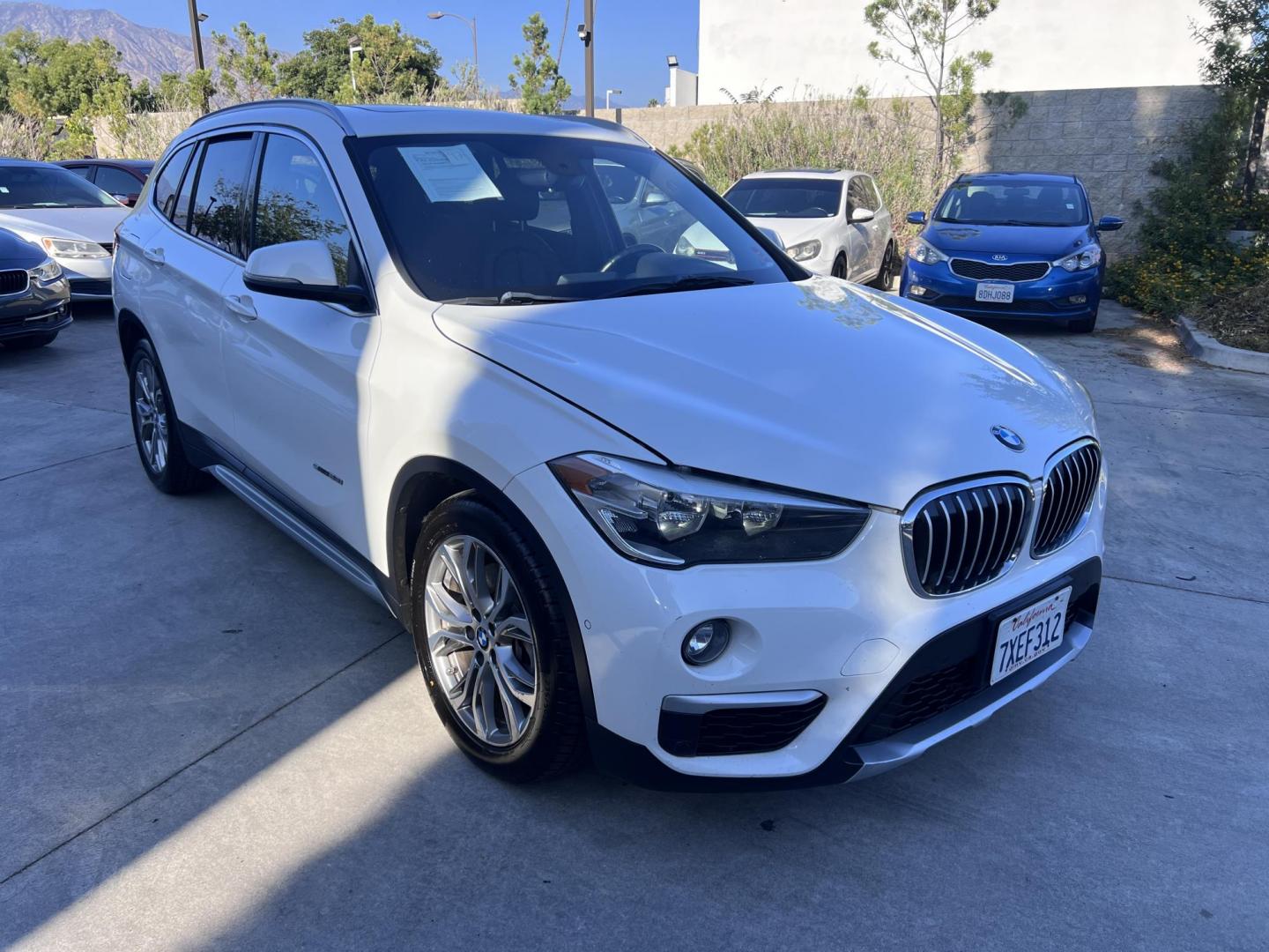 2017 Alpine White /Black BMW X1 sDrive28i (WBXHU7C38HP) with an 2.0L L4 DOHC 16V engine, 8A transmission, located at 30 S. Berkeley Avenue, Pasadena, CA, 91107, (626) 248-7567, 34.145447, -118.109398 - 2017 BMW X1 xDrive28i – Luxury AWD SUV – Buy Here Pay Here – $995 Down – Bad Credit OK – Crown City Motors – Pasadena, CA Looking for a luxury SUV that’s compact, powerful, and packed with high-end features—all without breaking the bank? Check out this 2017 BMW X1 xDrive28i, now a - Photo#10