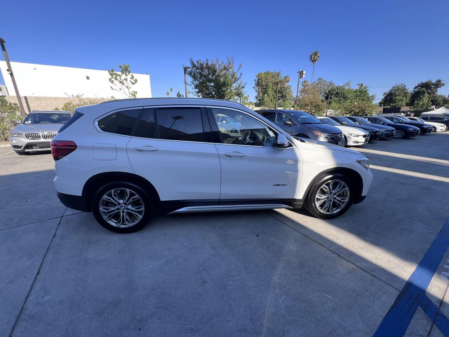 2017 Alpine White /Black BMW X1 sDrive28i (WBXHU7C38HP) with an 2.0L L4 DOHC 16V engine, 8A transmission, located at 30 S. Berkeley Avenue, Pasadena, CA, 91107, (626) 248-7567, 34.145447, -118.109398 - 2017 BMW X1 xDrive28i – Luxury AWD SUV – Buy Here Pay Here – $995 Down – Bad Credit OK – Crown City Motors – Pasadena, CA Looking for a luxury SUV that’s compact, powerful, and packed with high-end features—all without breaking the bank? Check out this 2017 BMW X1 xDrive28i, now a - Photo#11