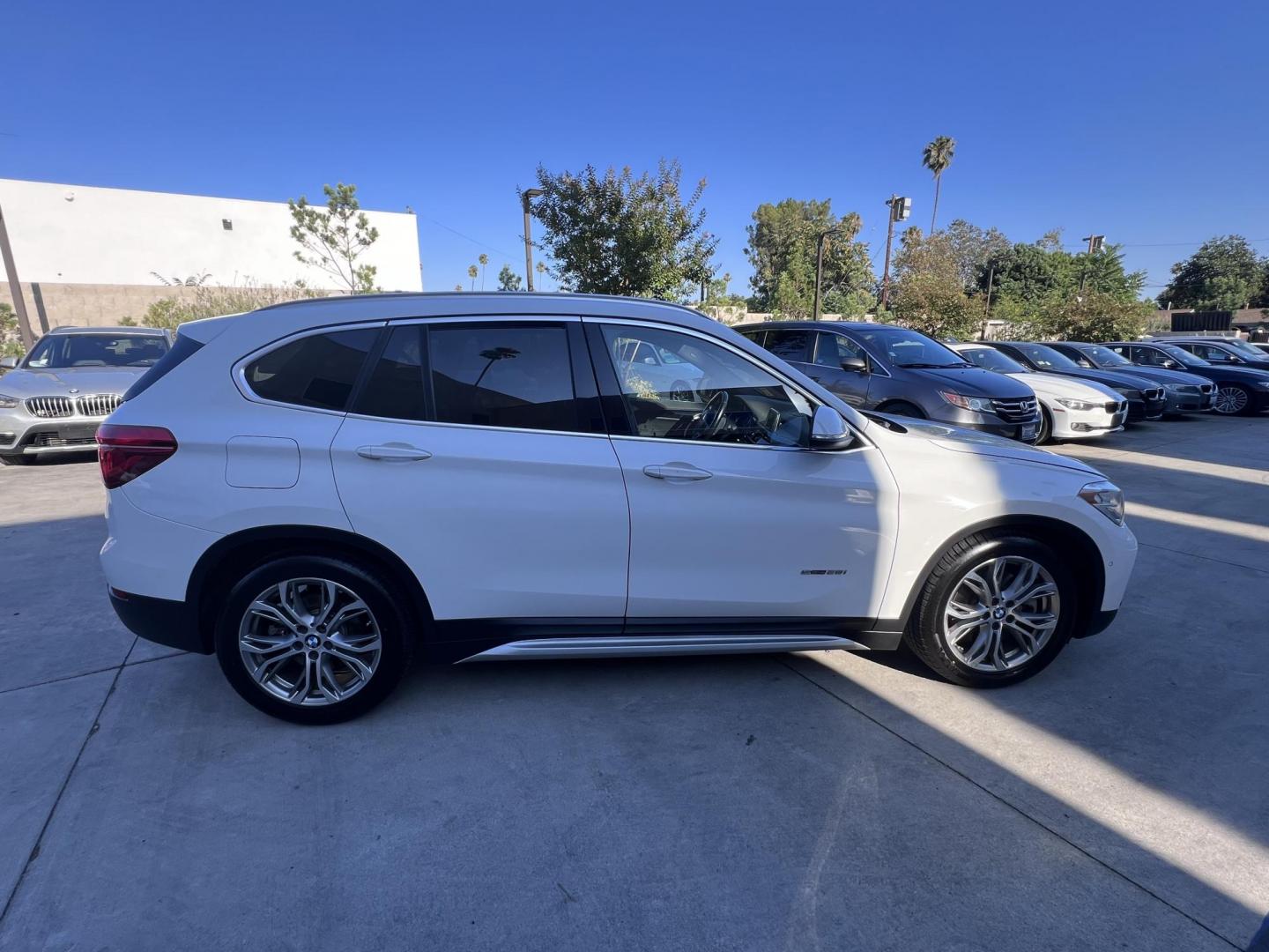 2017 Alpine White /Black BMW X1 sDrive28i (WBXHU7C38HP) with an 2.0L L4 DOHC 16V engine, 8A transmission, located at 30 S. Berkeley Avenue, Pasadena, CA, 91107, (626) 248-7567, 34.145447, -118.109398 - 2017 BMW X1 xDrive28i – Luxury AWD SUV – Buy Here Pay Here – $995 Down – Bad Credit OK – Crown City Motors – Pasadena, CA Looking for a luxury SUV that’s compact, powerful, and packed with high-end features—all without breaking the bank? Check out this 2017 BMW X1 xDrive28i, now a - Photo#12