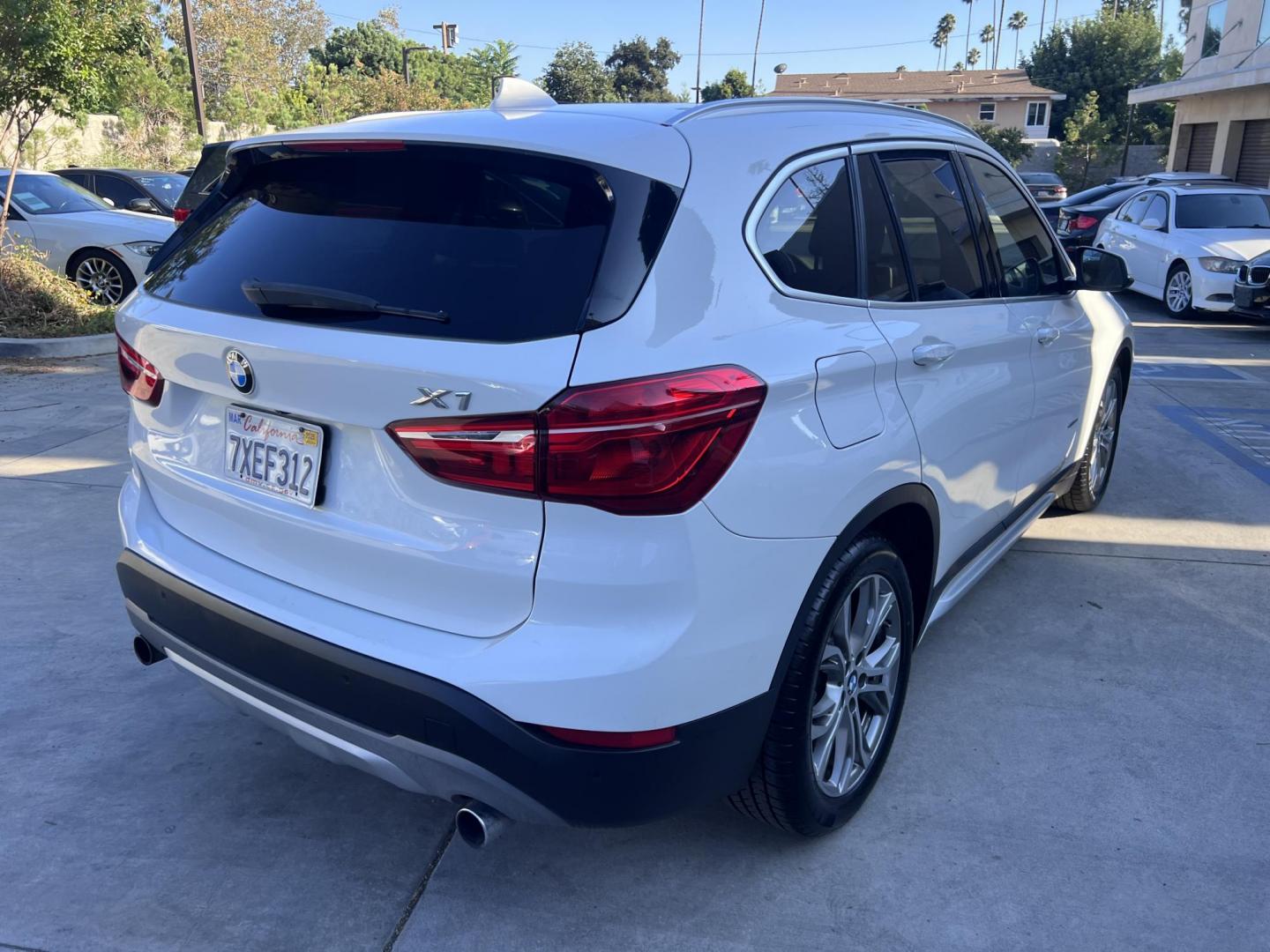 2017 Alpine White /Black BMW X1 sDrive28i (WBXHU7C38HP) with an 2.0L L4 DOHC 16V engine, 8A transmission, located at 30 S. Berkeley Avenue, Pasadena, CA, 91107, (626) 248-7567, 34.145447, -118.109398 - 2017 BMW X1 xDrive28i – Luxury AWD SUV – Buy Here Pay Here – $995 Down – Bad Credit OK – Crown City Motors – Pasadena, CA Looking for a luxury SUV that’s compact, powerful, and packed with high-end features—all without breaking the bank? Check out this 2017 BMW X1 xDrive28i, now a - Photo#13