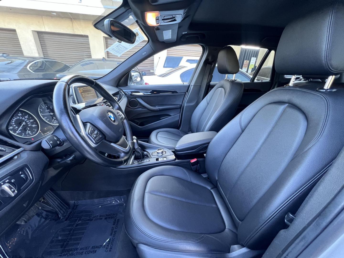 2017 Alpine White /Black BMW X1 sDrive28i (WBXHU7C38HP) with an 2.0L L4 DOHC 16V engine, 8A transmission, located at 30 S. Berkeley Avenue, Pasadena, CA, 91107, (626) 248-7567, 34.145447, -118.109398 - 2017 BMW X1 xDrive28i – Luxury AWD SUV – Buy Here Pay Here – $995 Down – Bad Credit OK – Crown City Motors – Pasadena, CA Looking for a luxury SUV that’s compact, powerful, and packed with high-end features—all without breaking the bank? Check out this 2017 BMW X1 xDrive28i, now a - Photo#17