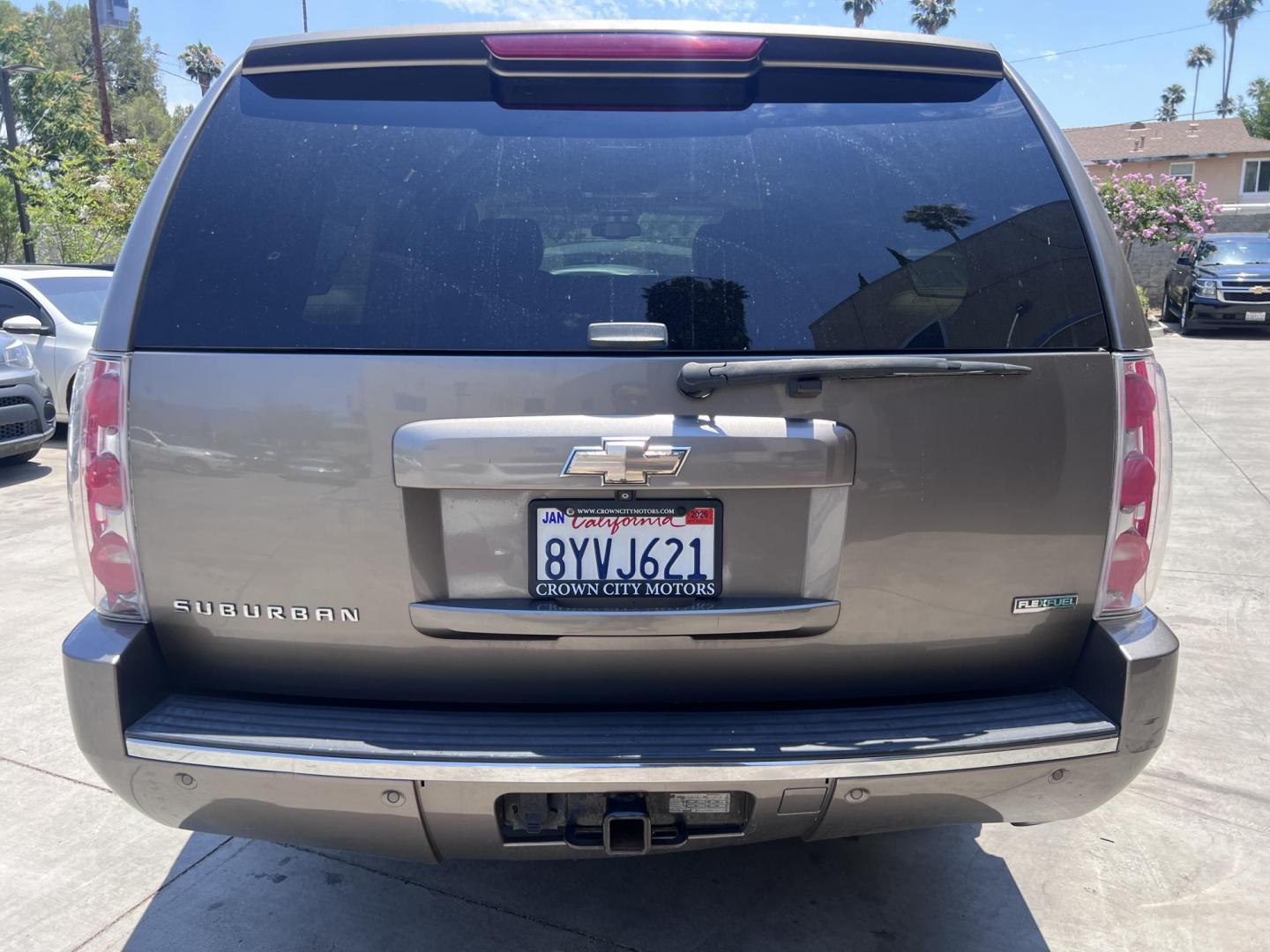 2011 Silver Metallic /Tan Chevrolet Suburban LTZ 1500 4WD (1GNSKKE31BR) with an 5.3L V8 OHV 16V FFV engine, 4-Speed Automatic transmission, located at 30 S. Berkeley Avenue, Pasadena, CA, 91107, (626) 248-7567, 34.145447, -118.109398 - 2011 Chevrolet Suburban LT 4WD – 3rd Row – $995 Down – Buy Here Pay Here – Bad Credit OK – Crown City Motors – Pasadena, CA Looking for a full-size SUV that offers unmatched space, power, and versatility? Look no further than this 2011 Chevrolet Suburban LT 4WD, now available at Crown - Photo#3
