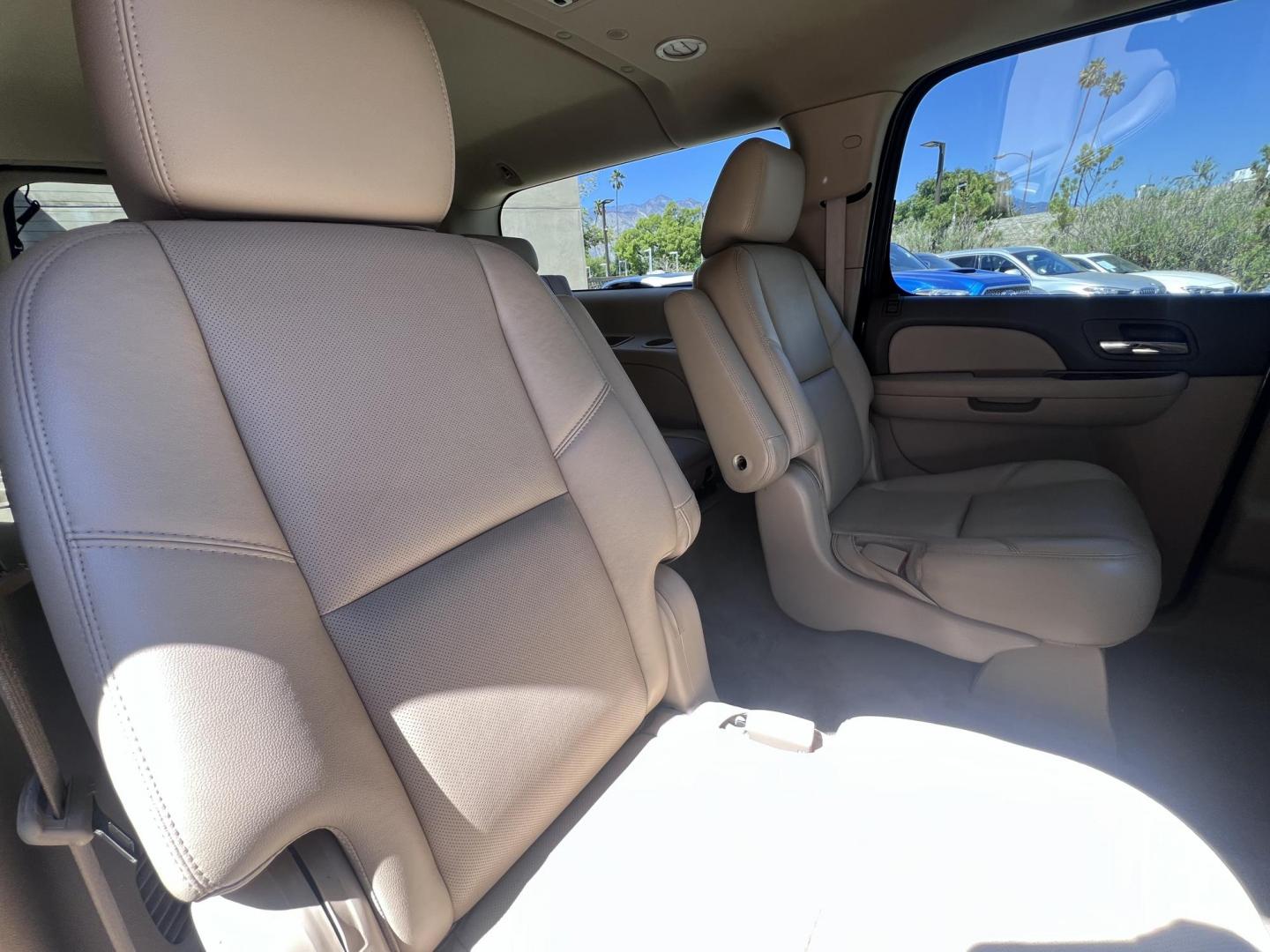 2011 Silver Metallic /Tan Chevrolet Suburban LTZ 1500 4WD (1GNSKKE31BR) with an 5.3L V8 OHV 16V FFV engine, 4-Speed Automatic transmission, located at 30 S. Berkeley Avenue, Pasadena, CA, 91107, (626) 248-7567, 34.145447, -118.109398 - 2011 Chevrolet Suburban LT 4WD – 3rd Row – $995 Down – Buy Here Pay Here – Bad Credit OK – Crown City Motors – Pasadena, CA Looking for a full-size SUV that offers unmatched space, power, and versatility? Look no further than this 2011 Chevrolet Suburban LT 4WD, now available at Crown - Photo#30