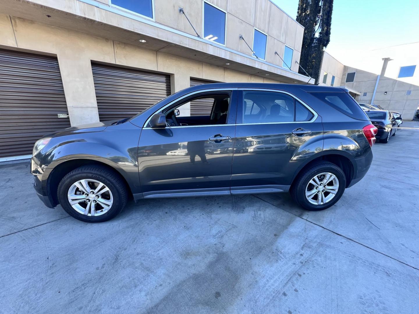 2017 Gray /Black Chevrolet Equinox LS 2WD (2GNALBEK9H1) with an 2.4L L4 DOHC 16V FFV engine, 6A transmission, located at 30 S. Berkeley Avenue, Pasadena, CA, 91107, (626) 248-7567, 34.145447, -118.109398 - 2017 Chevrolet Equinox LS – Fuel-Efficient SUV – Buy Here Pay Here – $995 Down – Bad Credit OK – Crown City Motors – Pasadena, CA Need a dependable SUV with room for the family, great fuel economy, and affordable payments? This 2017 Chevrolet Equinox LS is the perfect compact SUV for - Photo#1