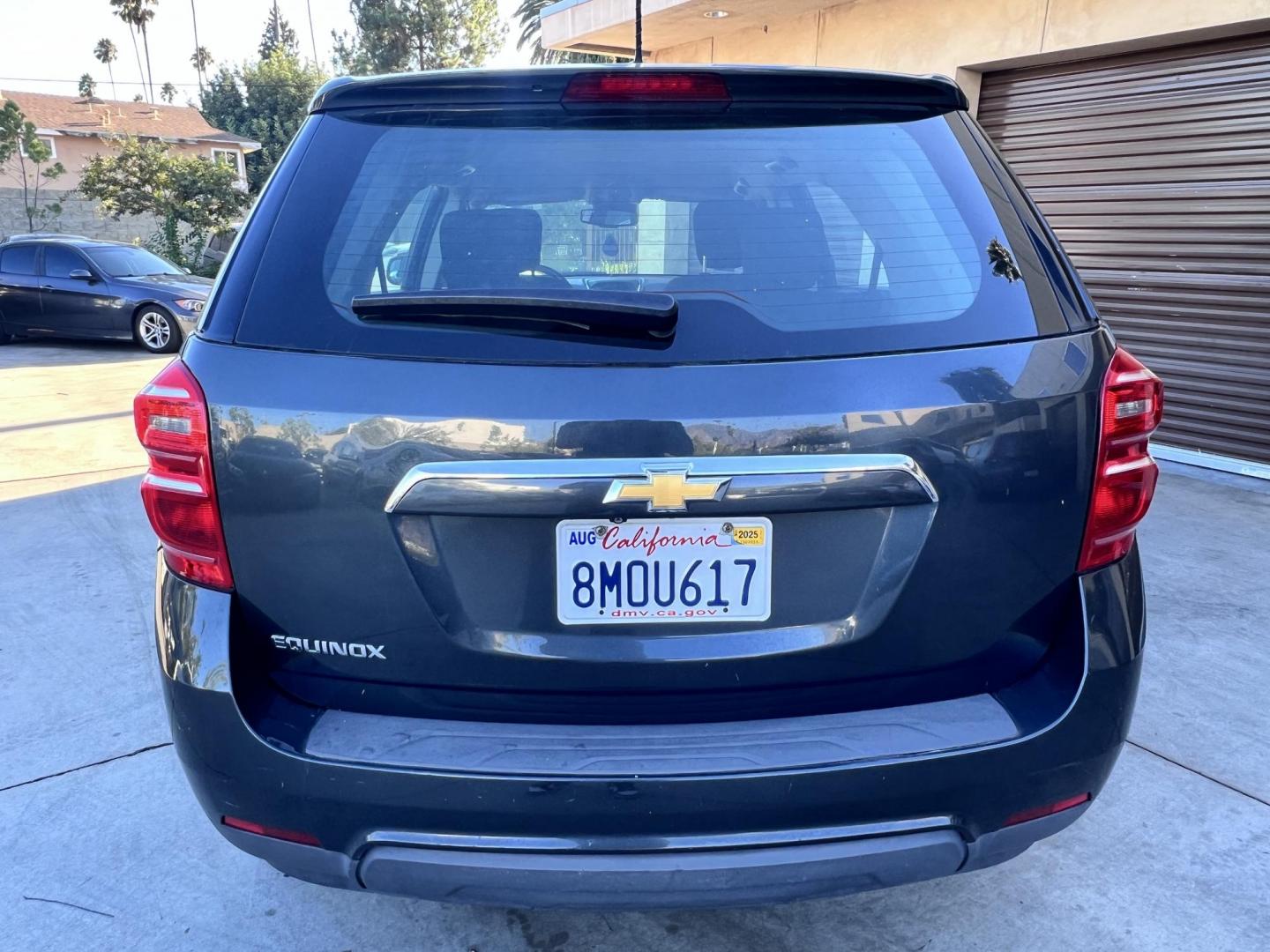 2017 Gray /Black Chevrolet Equinox LS 2WD (2GNALBEK9H1) with an 2.4L L4 DOHC 16V FFV engine, 6A transmission, located at 30 S. Berkeley Avenue, Pasadena, CA, 91107, (626) 248-7567, 34.145447, -118.109398 - 2017 Chevrolet Equinox LS – Fuel-Efficient SUV – Buy Here Pay Here – $995 Down – Bad Credit OK – Crown City Motors – Pasadena, CA Need a dependable SUV with room for the family, great fuel economy, and affordable payments? This 2017 Chevrolet Equinox LS is the perfect compact SUV for - Photo#3