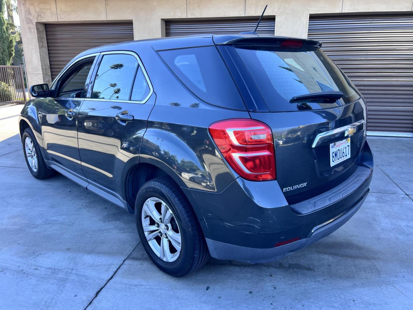 2017 Gray /Black Chevrolet Equinox LS 2WD (2GNALBEK9H1) with an 2.4L L4 DOHC 16V FFV engine, 6A transmission, located at 30 S. Berkeley Avenue, Pasadena, CA, 91107, (626) 248-7567, 34.145447, -118.109398 - 2017 Chevrolet Equinox LS – Fuel-Efficient SUV – Buy Here Pay Here – $995 Down – Bad Credit OK – Crown City Motors – Pasadena, CA Need a dependable SUV with room for the family, great fuel economy, and affordable payments? This 2017 Chevrolet Equinox LS is the perfect compact SUV for - Photo#4