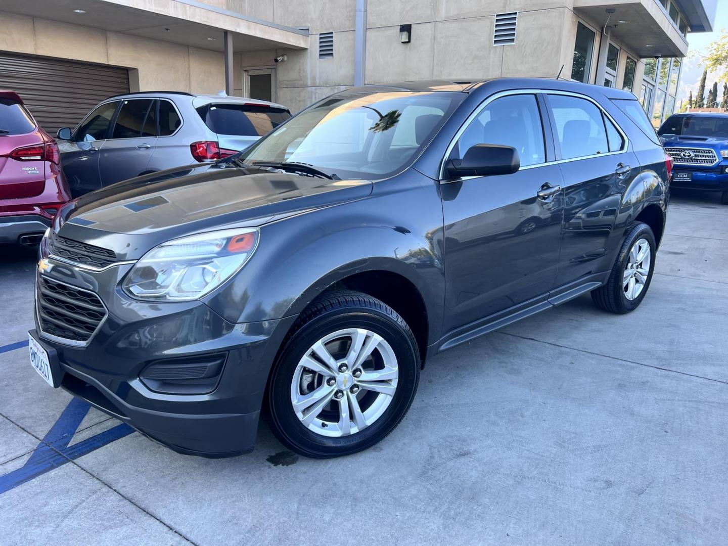2017 Gray /Black Chevrolet Equinox LS 2WD (2GNALBEK9H1) with an 2.4L L4 DOHC 16V FFV engine, 6A transmission, located at 30 S. Berkeley Avenue, Pasadena, CA, 91107, (626) 248-7567, 34.145447, -118.109398 - 2017 Chevrolet Equinox LS – Fuel-Efficient SUV – Buy Here Pay Here – $995 Down – Bad Credit OK – Crown City Motors – Pasadena, CA Need a dependable SUV with room for the family, great fuel economy, and affordable payments? This 2017 Chevrolet Equinox LS is the perfect compact SUV for - Photo#5