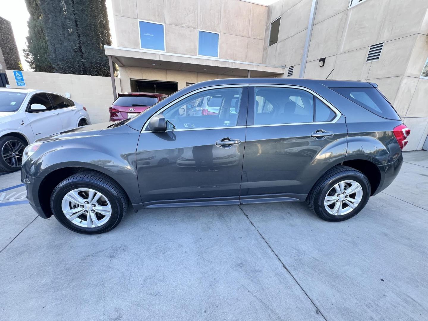2017 Gray /Black Chevrolet Equinox LS 2WD (2GNALBEK9H1) with an 2.4L L4 DOHC 16V FFV engine, 6A transmission, located at 30 S. Berkeley Avenue, Pasadena, CA, 91107, (626) 248-7567, 34.145447, -118.109398 - 2017 Chevrolet Equinox LS – Fuel-Efficient SUV – Buy Here Pay Here – $995 Down – Bad Credit OK – Crown City Motors – Pasadena, CA Need a dependable SUV with room for the family, great fuel economy, and affordable payments? This 2017 Chevrolet Equinox LS is the perfect compact SUV for - Photo#6