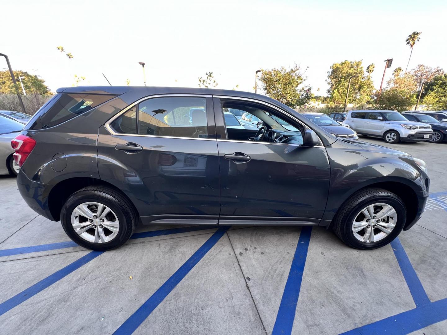 2017 Gray /Black Chevrolet Equinox LS 2WD (2GNALBEK9H1) with an 2.4L L4 DOHC 16V FFV engine, 6A transmission, located at 30 S. Berkeley Avenue, Pasadena, CA, 91107, (626) 248-7567, 34.145447, -118.109398 - 2017 Chevrolet Equinox LS – Fuel-Efficient SUV – Buy Here Pay Here – $995 Down – Bad Credit OK – Crown City Motors – Pasadena, CA Need a dependable SUV with room for the family, great fuel economy, and affordable payments? This 2017 Chevrolet Equinox LS is the perfect compact SUV for - Photo#7
