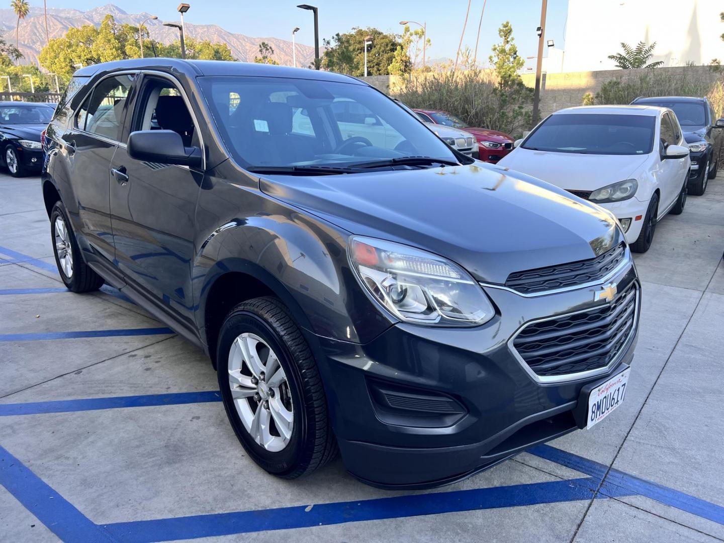 2017 Gray /Black Chevrolet Equinox LS 2WD (2GNALBEK9H1) with an 2.4L L4 DOHC 16V FFV engine, 6A transmission, located at 30 S. Berkeley Avenue, Pasadena, CA, 91107, (626) 248-7567, 34.145447, -118.109398 - 2017 Chevrolet Equinox LS – Fuel-Efficient SUV – Buy Here Pay Here – $995 Down – Bad Credit OK – Crown City Motors – Pasadena, CA Need a dependable SUV with room for the family, great fuel economy, and affordable payments? This 2017 Chevrolet Equinox LS is the perfect compact SUV for - Photo#12