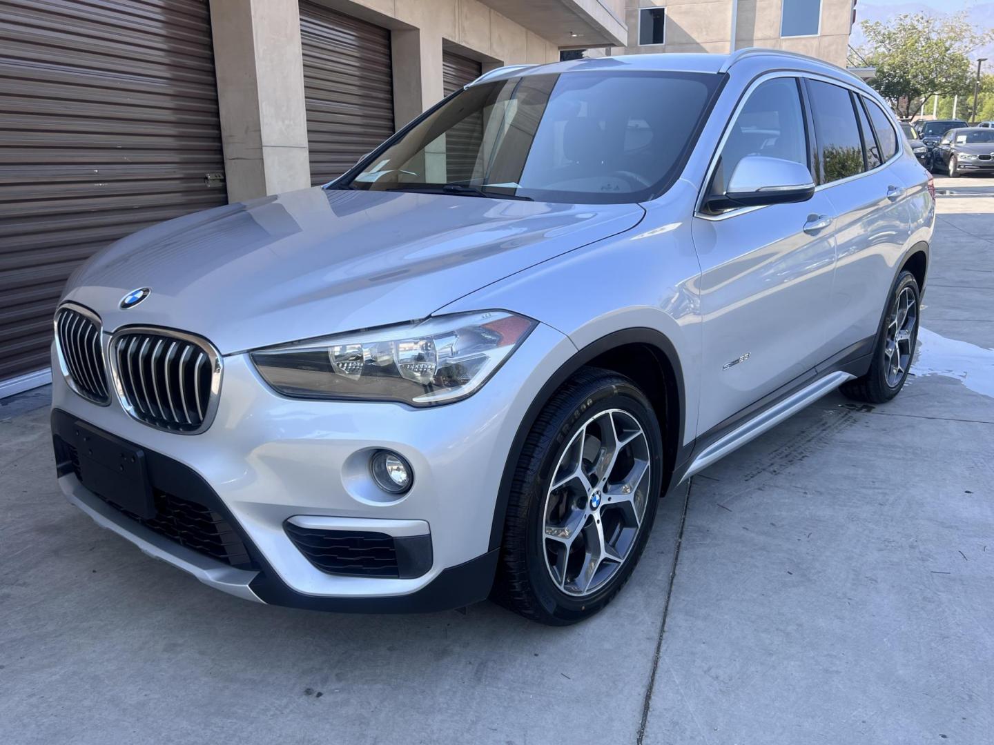 2018 Silver Metallic /Black BMW X1 sDrive28i (WBXHU7C34J5) with an 2.0L L4 DOHC 16V engine, 8A transmission, located at 30 S. Berkeley Avenue, Pasadena, CA, 91107, (626) 248-7567, 34.145447, -118.109398 - 2018 BMW X1 xDrive28i – Luxury, Performance, and Affordability in One SUV VIN: WBXHU7C34J5H42594 Location: Crown City Motors, Pasadena, CA Status: Available Now – Clean Title – Financing Options for All Credit Types Looking for a luxury crossover SUV that combines sporty performance, ele - Photo#8
