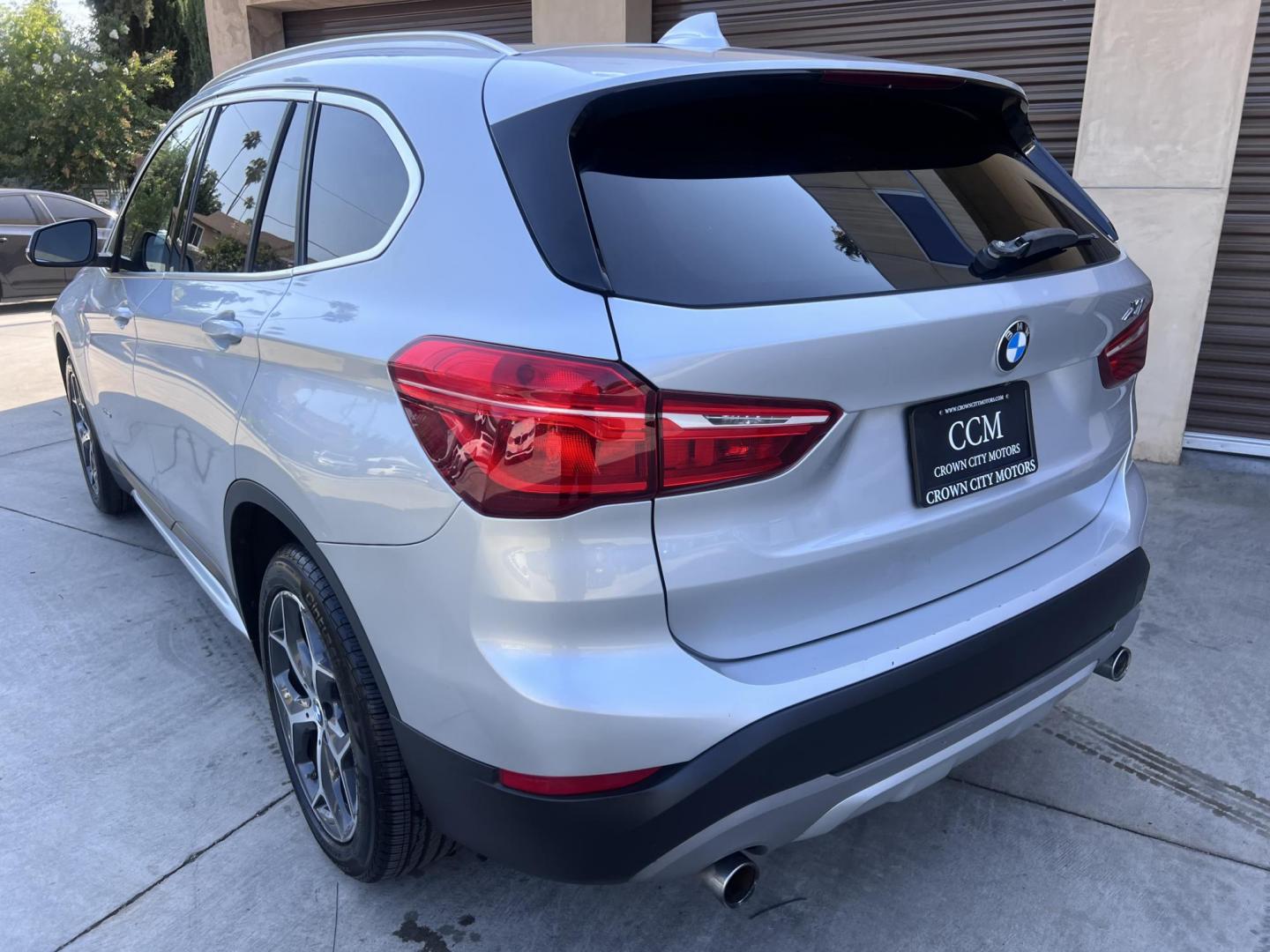 2018 Silver Metallic /Black BMW X1 sDrive28i (WBXHU7C34J5) with an 2.0L L4 DOHC 16V engine, 8A transmission, located at 30 S. Berkeley Avenue, Pasadena, CA, 91107, (626) 248-7567, 34.145447, -118.109398 - 2018 BMW X1 xDrive28i – Luxury, Performance, and Affordability in One SUV VIN: WBXHU7C34J5H42594 Location: Crown City Motors, Pasadena, CA Status: Available Now – Clean Title – Financing Options for All Credit Types Looking for a luxury crossover SUV that combines sporty performance, ele - Photo#10