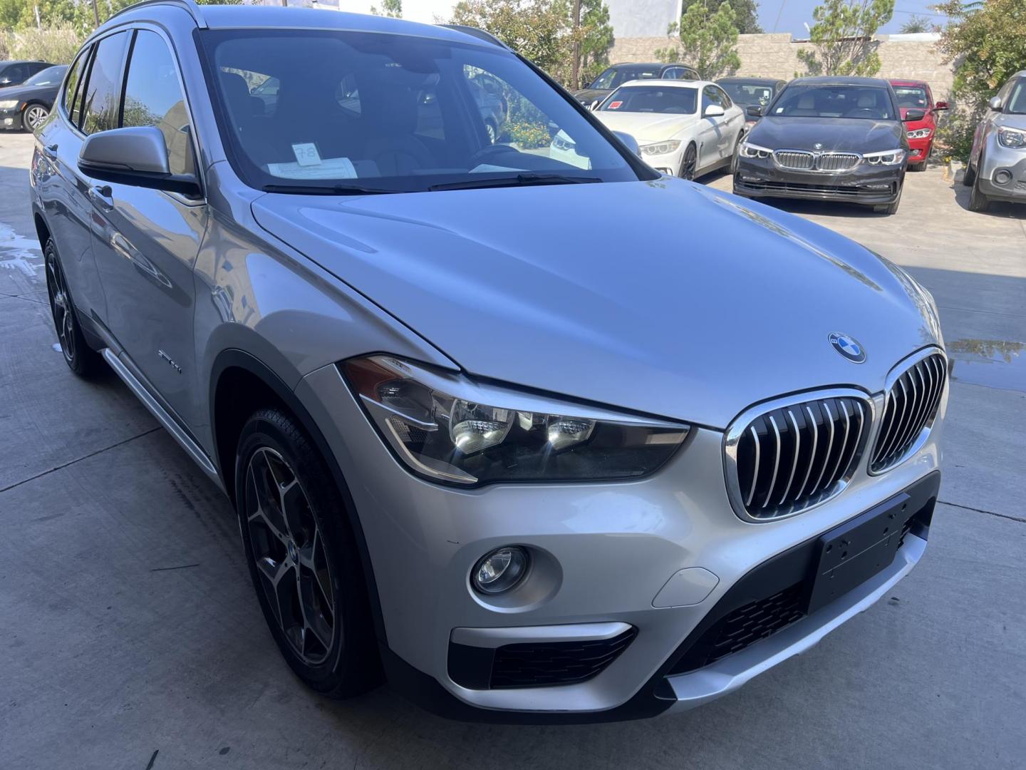 2018 Silver Metallic /Black BMW X1 sDrive28i (WBXHU7C34J5) with an 2.0L L4 DOHC 16V engine, 8A transmission, located at 30 S. Berkeley Avenue, Pasadena, CA, 91107, (626) 248-7567, 34.145447, -118.109398 - 2018 BMW X1 xDrive28i – Luxury, Performance, and Affordability in One SUV VIN: WBXHU7C34J5H42594 Location: Crown City Motors, Pasadena, CA Status: Available Now – Clean Title – Financing Options for All Credit Types Looking for a luxury crossover SUV that combines sporty performance, ele - Photo#14