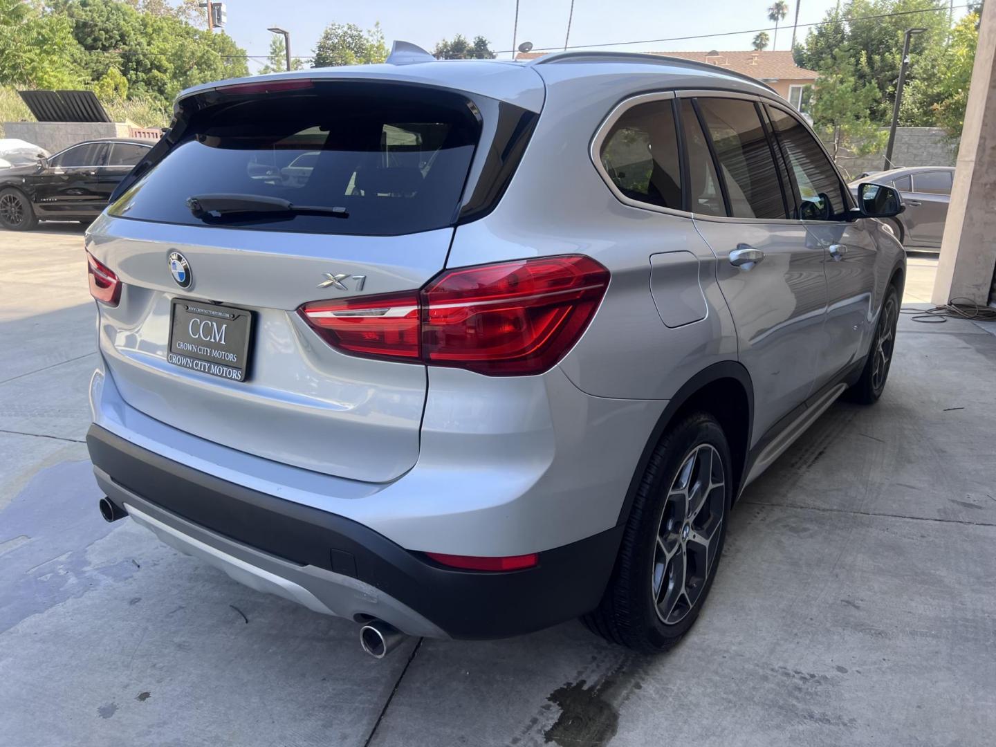 2018 Silver Metallic /Black BMW X1 sDrive28i (WBXHU7C34J5) with an 2.0L L4 DOHC 16V engine, 8A transmission, located at 30 S. Berkeley Avenue, Pasadena, CA, 91107, (626) 248-7567, 34.145447, -118.109398 - 2018 BMW X1 xDrive28i – Luxury, Performance, and Affordability in One SUV VIN: WBXHU7C34J5H42594 Location: Crown City Motors, Pasadena, CA Status: Available Now – Clean Title – Financing Options for All Credit Types Looking for a luxury crossover SUV that combines sporty performance, ele - Photo#16