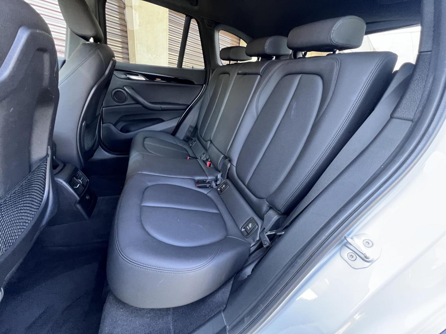 2018 Silver Metallic /Black BMW X1 sDrive28i (WBXHU7C34J5) with an 2.0L L4 DOHC 16V engine, 8A transmission, located at 30 S. Berkeley Avenue, Pasadena, CA, 91107, (626) 248-7567, 34.145447, -118.109398 - 2018 BMW X1 xDrive28i – Luxury, Performance, and Affordability in One SUV VIN: WBXHU7C34J5H42594 Location: Crown City Motors, Pasadena, CA Status: Available Now – Clean Title – Financing Options for All Credit Types Looking for a luxury crossover SUV that combines sporty performance, ele - Photo#18